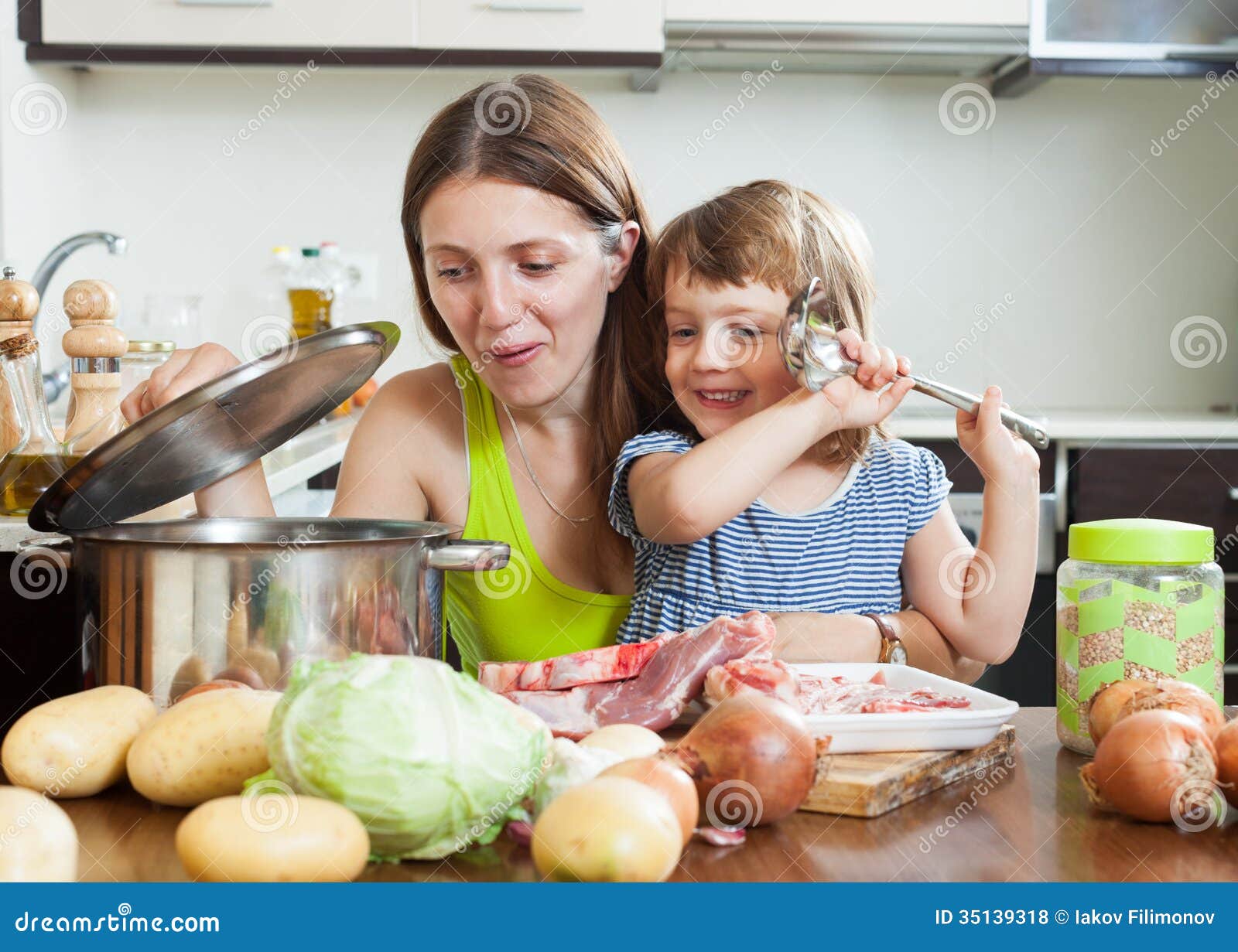 Mother with Child Making Soup Stock Photo - Image of kitchen, daughter