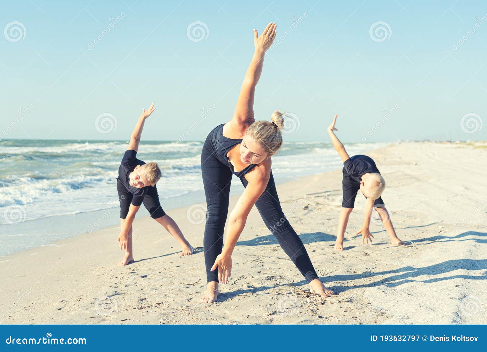 Mother and Children Do Exercises on the Beach, they Meet the  Sunrise.Fitness, Sport, Yoga and Healthy Lifestyle Concept. Stock Image -  Image of health, portrait: 193632797