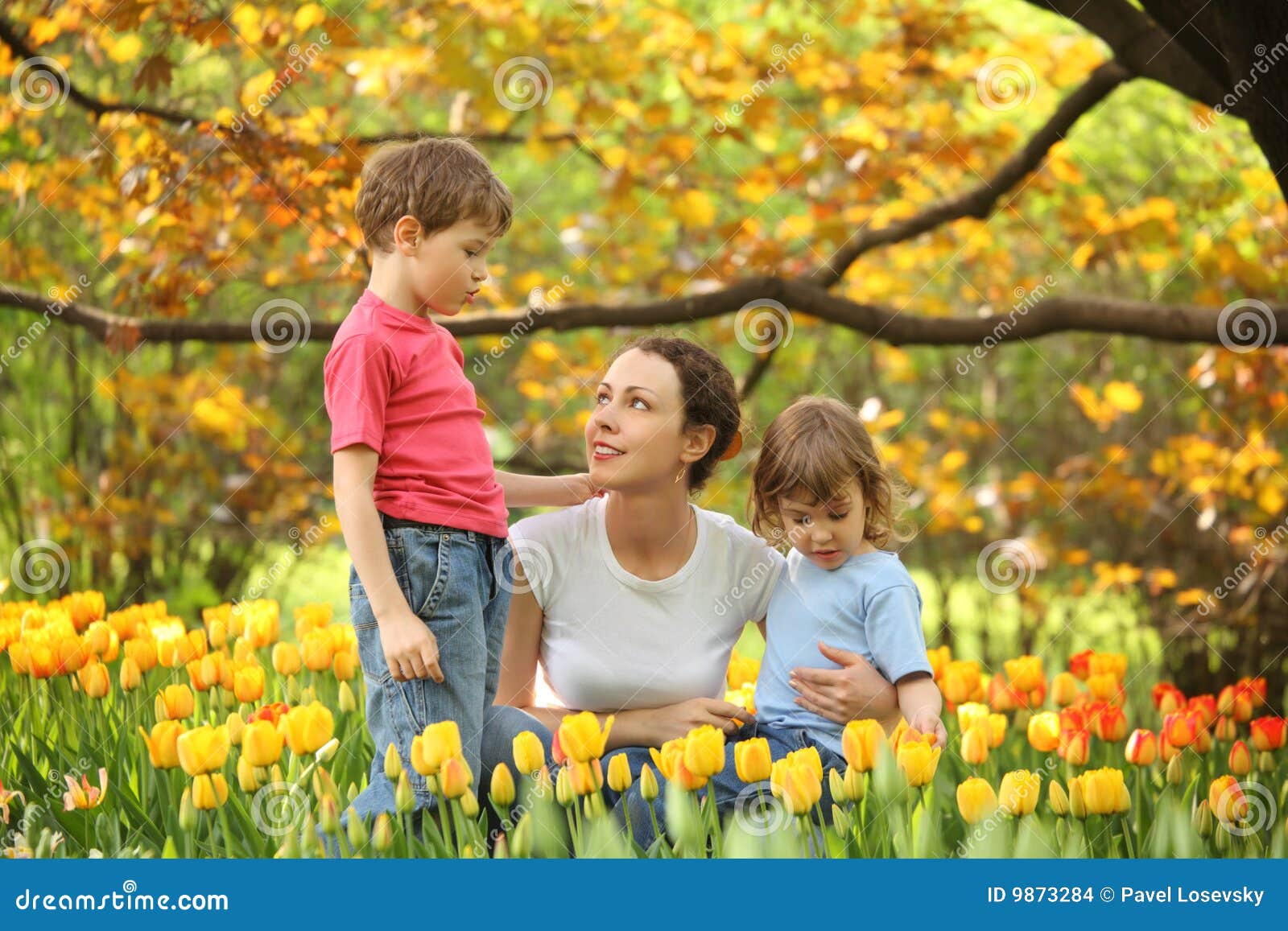 Mother with Children in Garden among Tulips Stock Photo Image of adorable, daughter 9873284