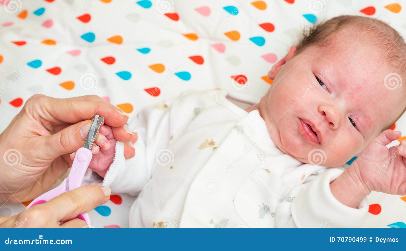 Mother Cutting Fingernails Of Her Newborn Baby Stock Image ...