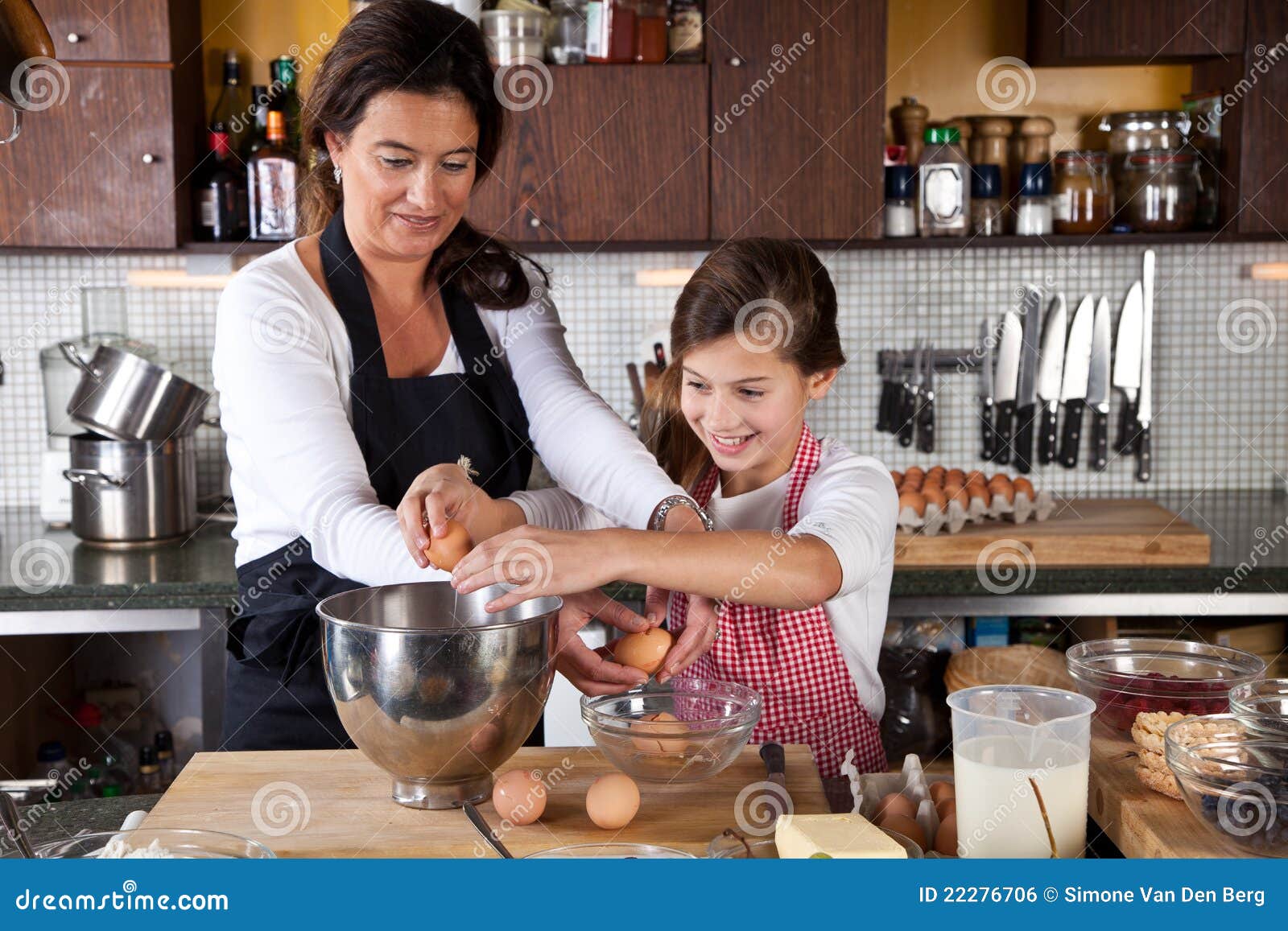 Mother and Daughter Baking Together in the Kitchen Stock Photo Image