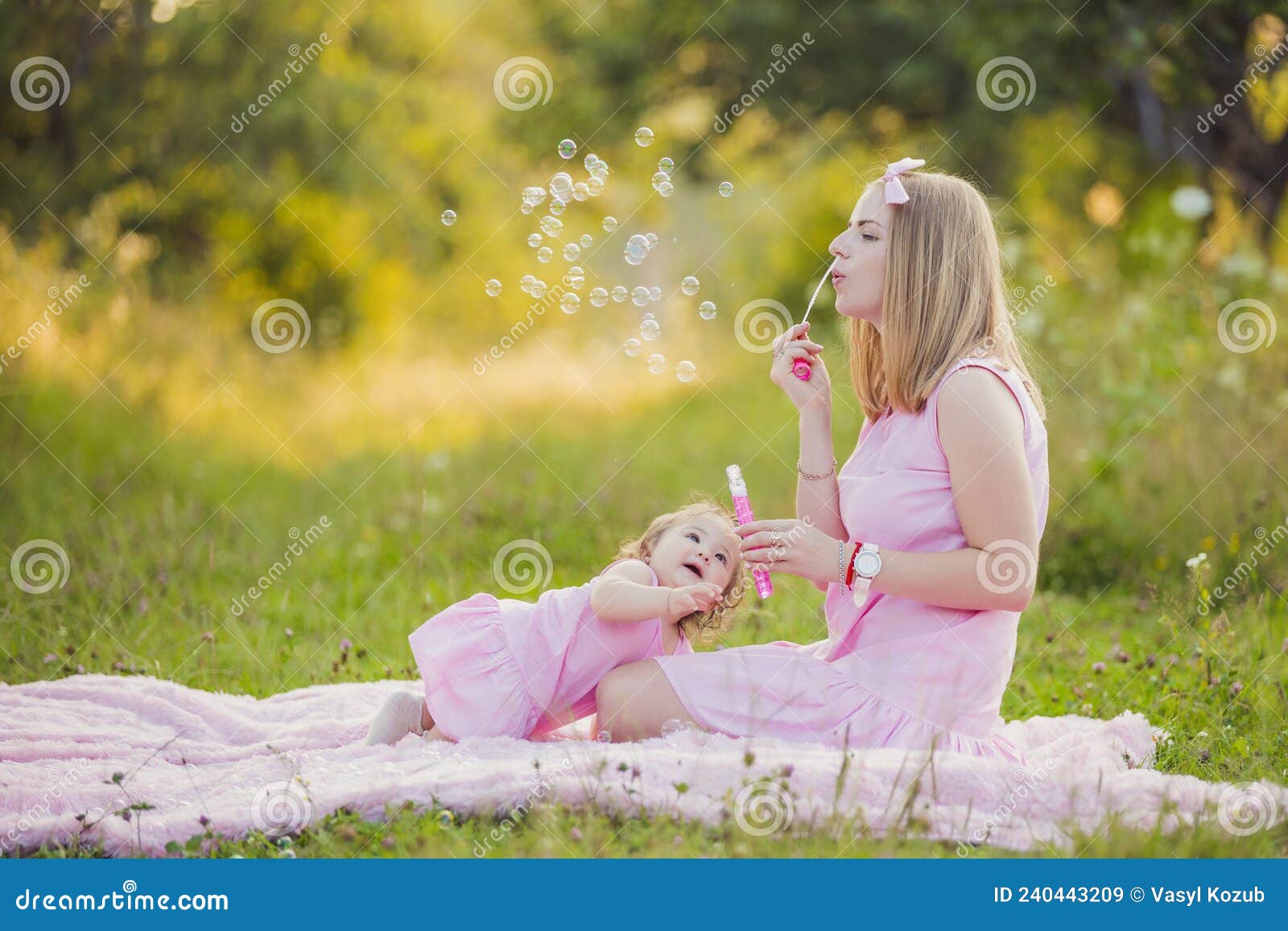 Mother And Daughter Blowing Bubbles Stock Image Image Of Blow