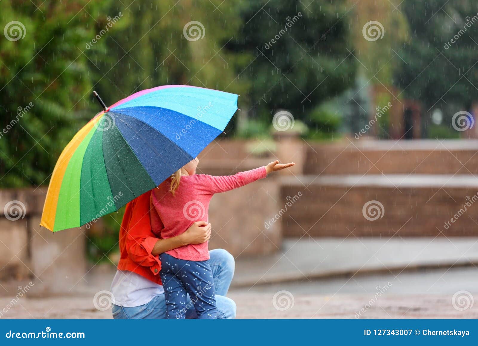 Mother and Daughter with Bright Umbrella Under Rain Stock Image - Image ...