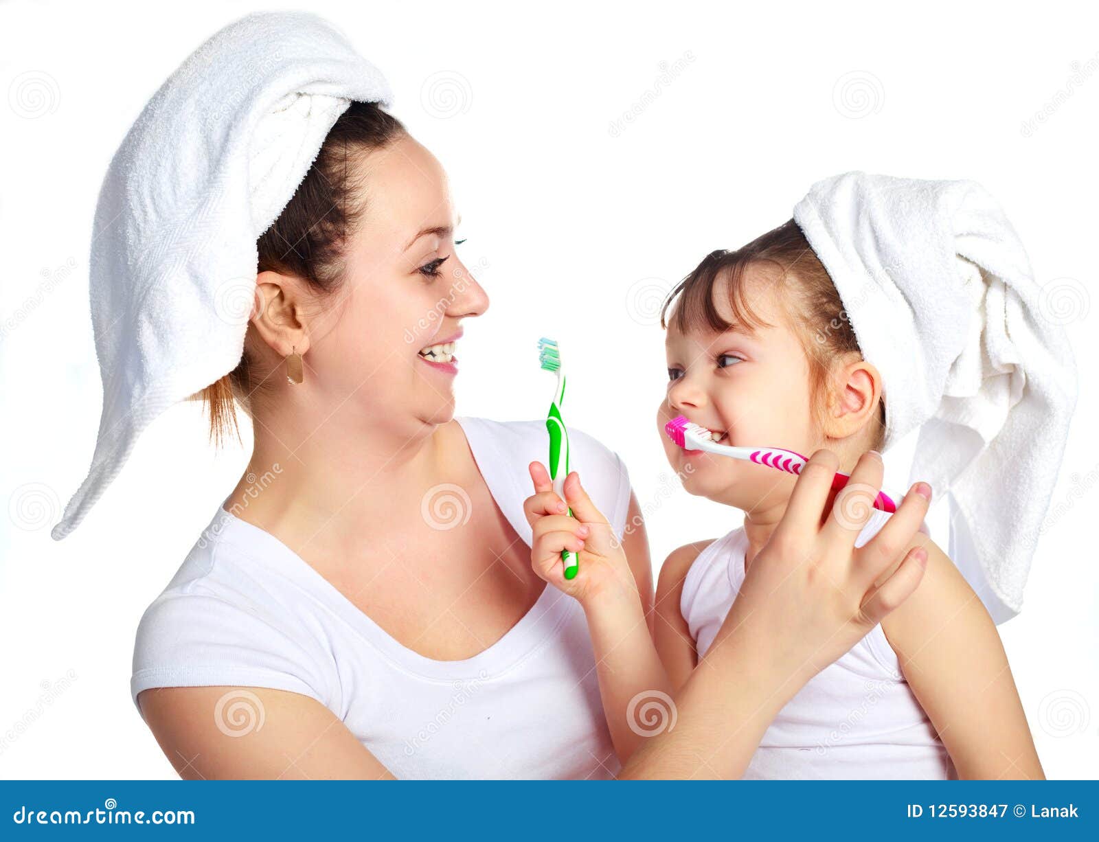 Mother And Daughter Brushing Teeth Royalty Free Stock Photography