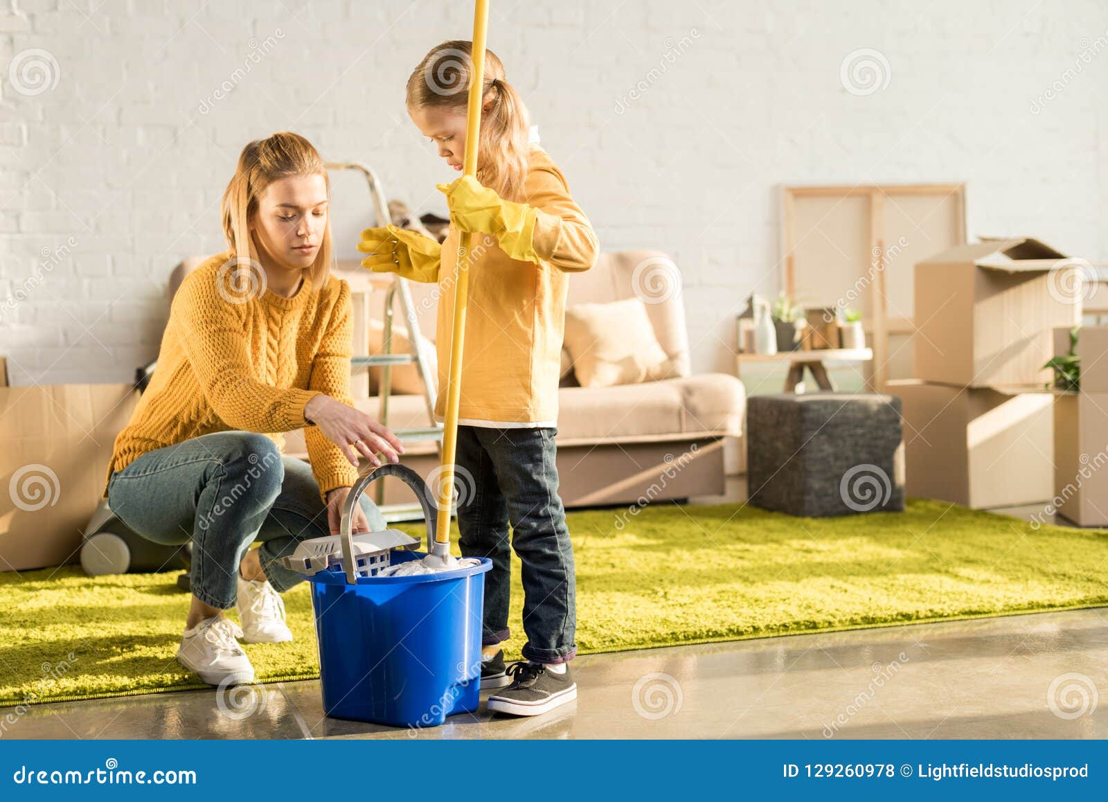 Mother and Daughter Cleaning Apartment with Mop Stock Photo Image of