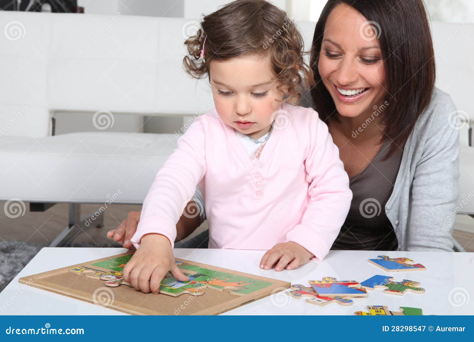 Mother and Daughter Completing Jigsaw Stock Image Image of