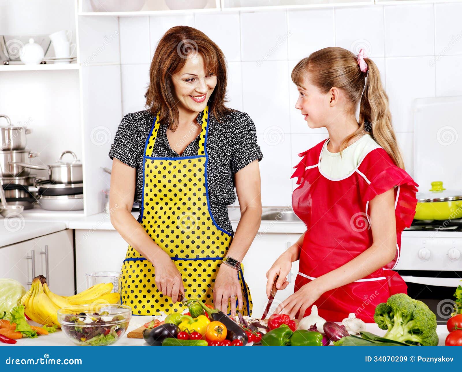 Mother And Daughter Cooking At Kitchen Royalty Free Stock Images Image 34070209 