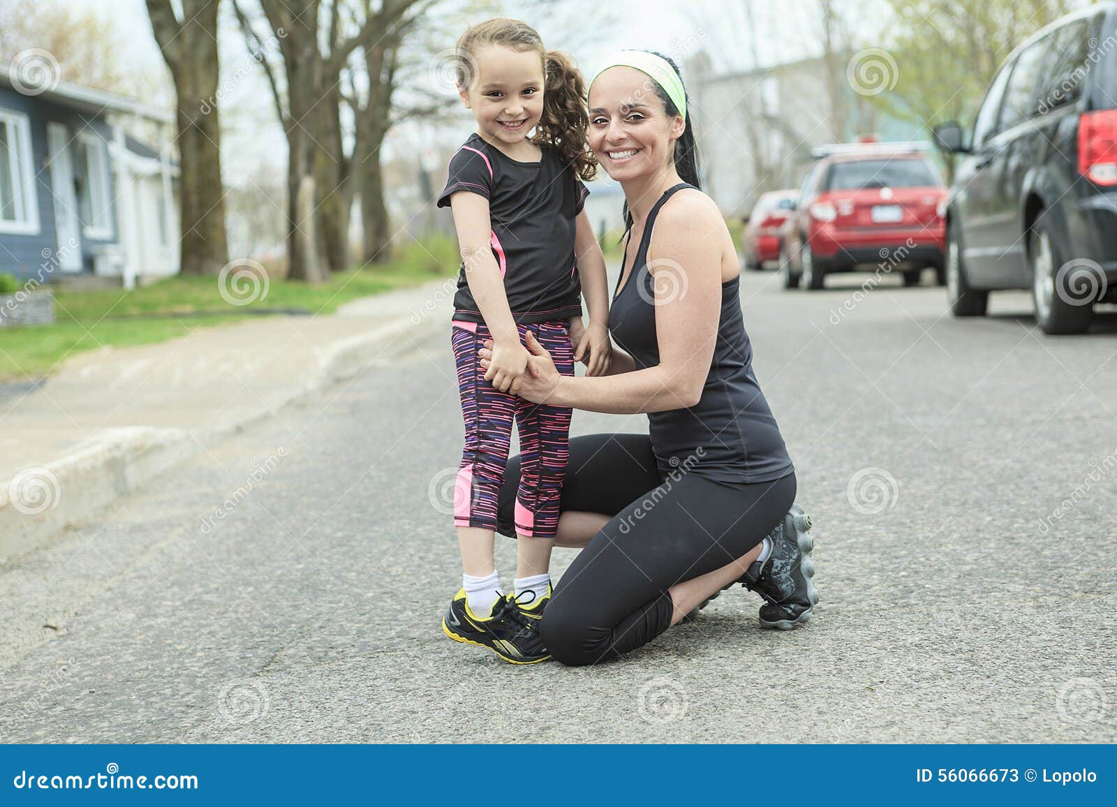 Mother and Daughter Doing Exercises Together Stock Image Image of