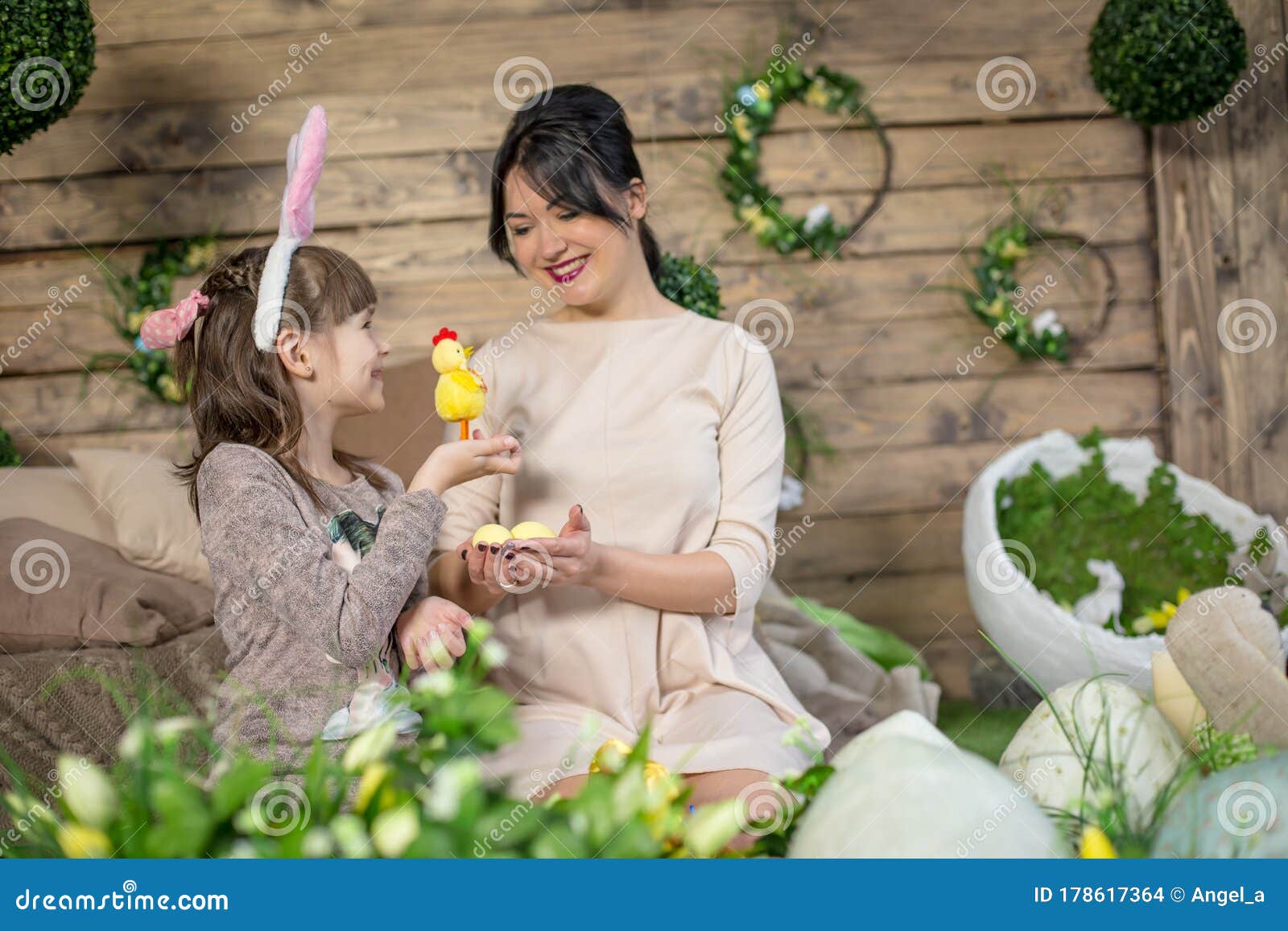 Mother and Daughter with Easter Eggs in Studio Stock Photo - Image of
