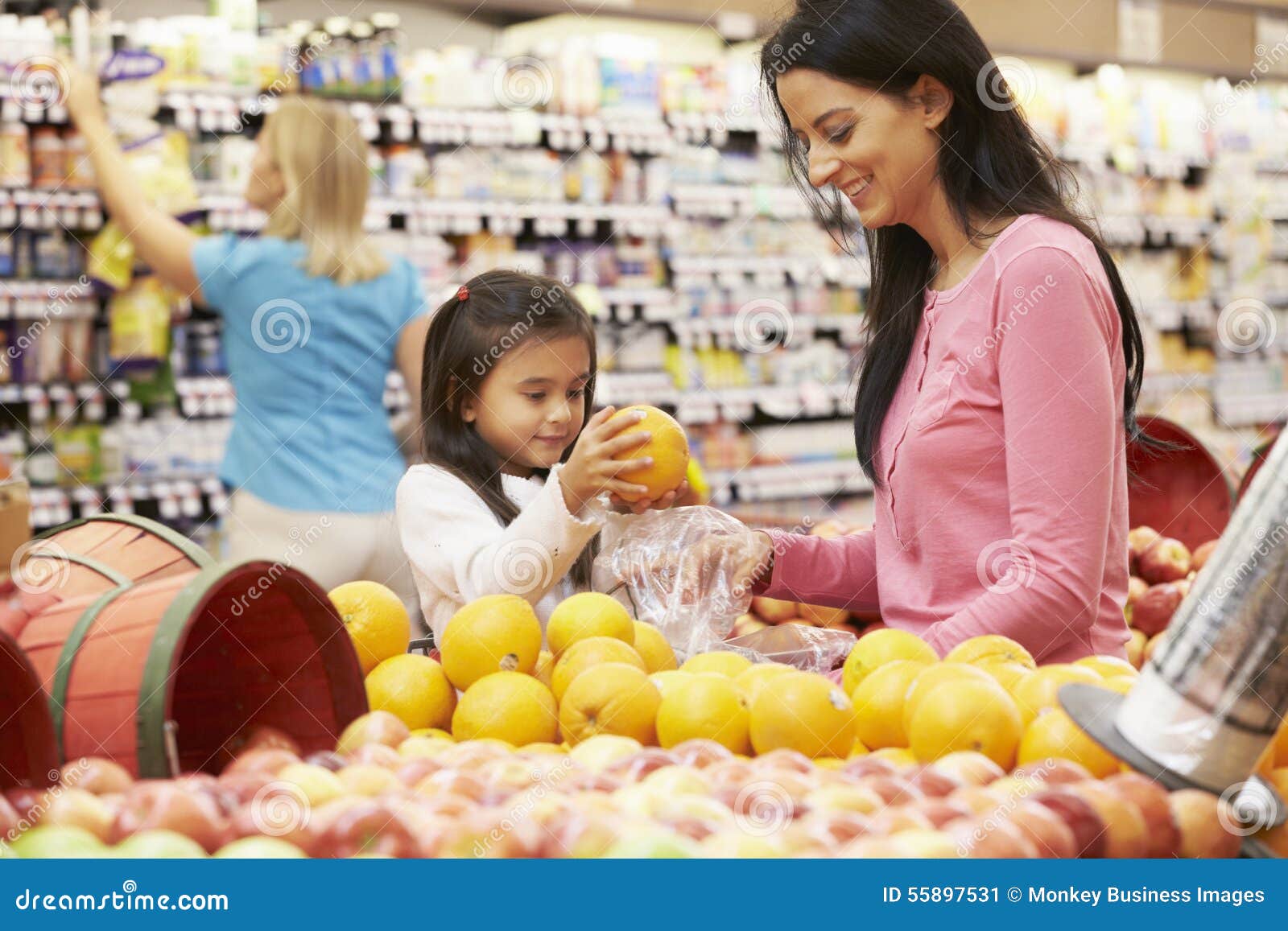 Mother and Daughter at Fruit Counter in Supermarket Stock Image Image