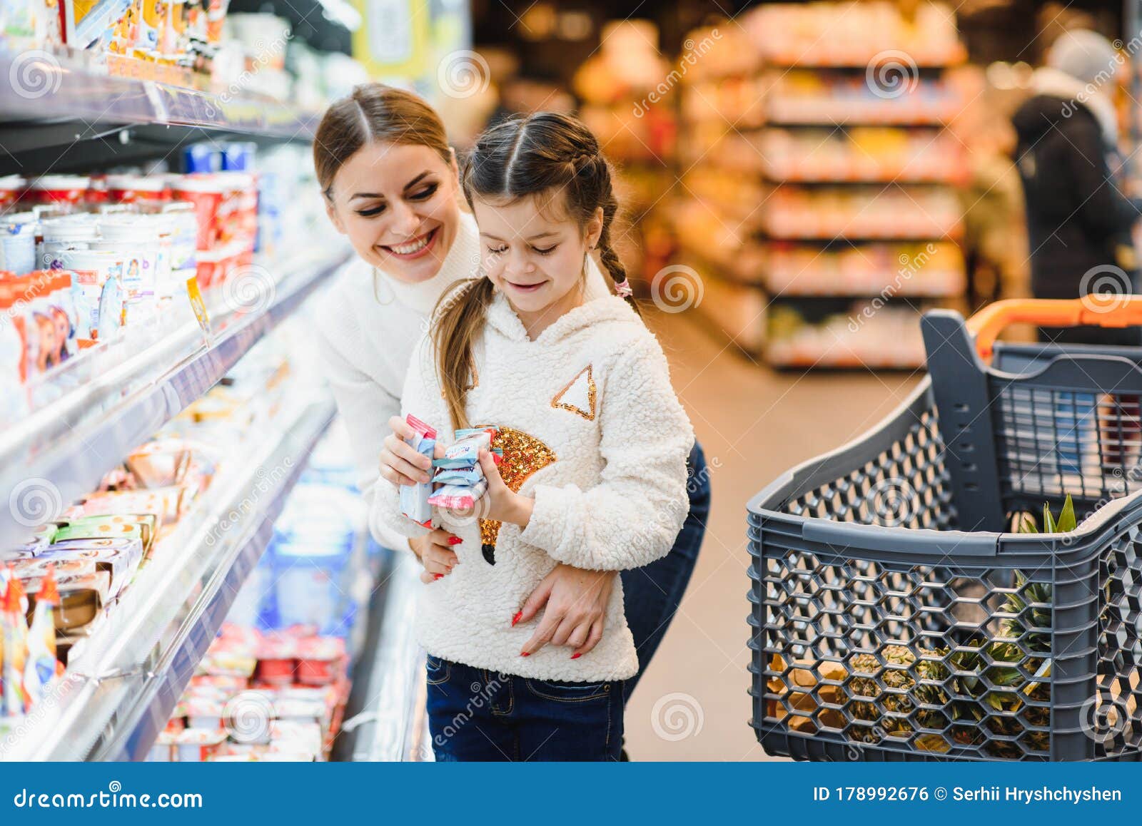 Mother with Daughter at a Grocery Store Stock Photo - Image of market ...