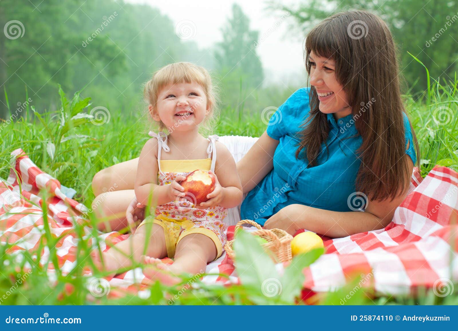 Download Mother And Daughter Have Picnic Eating Apples Stock Photo ...