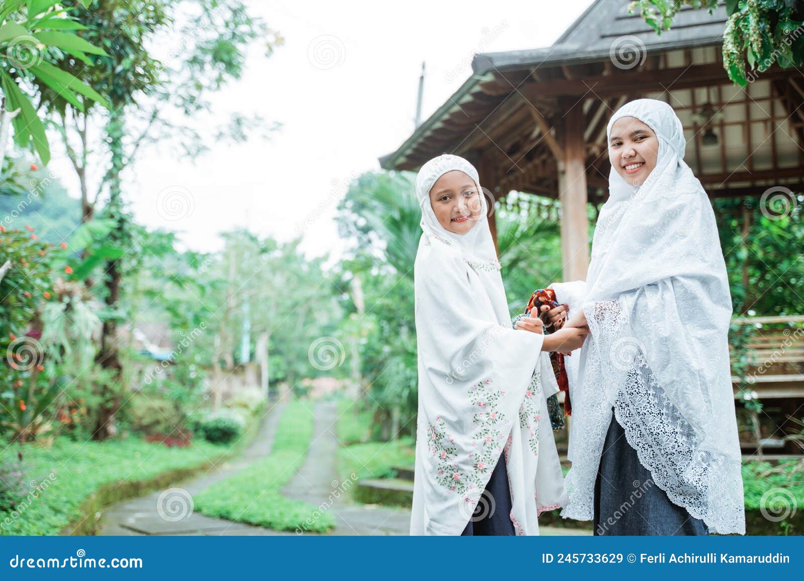 Mother And Daughter With Hijab Walking To The Mosque To Do Idul Fitri Prayer Stock Image Image