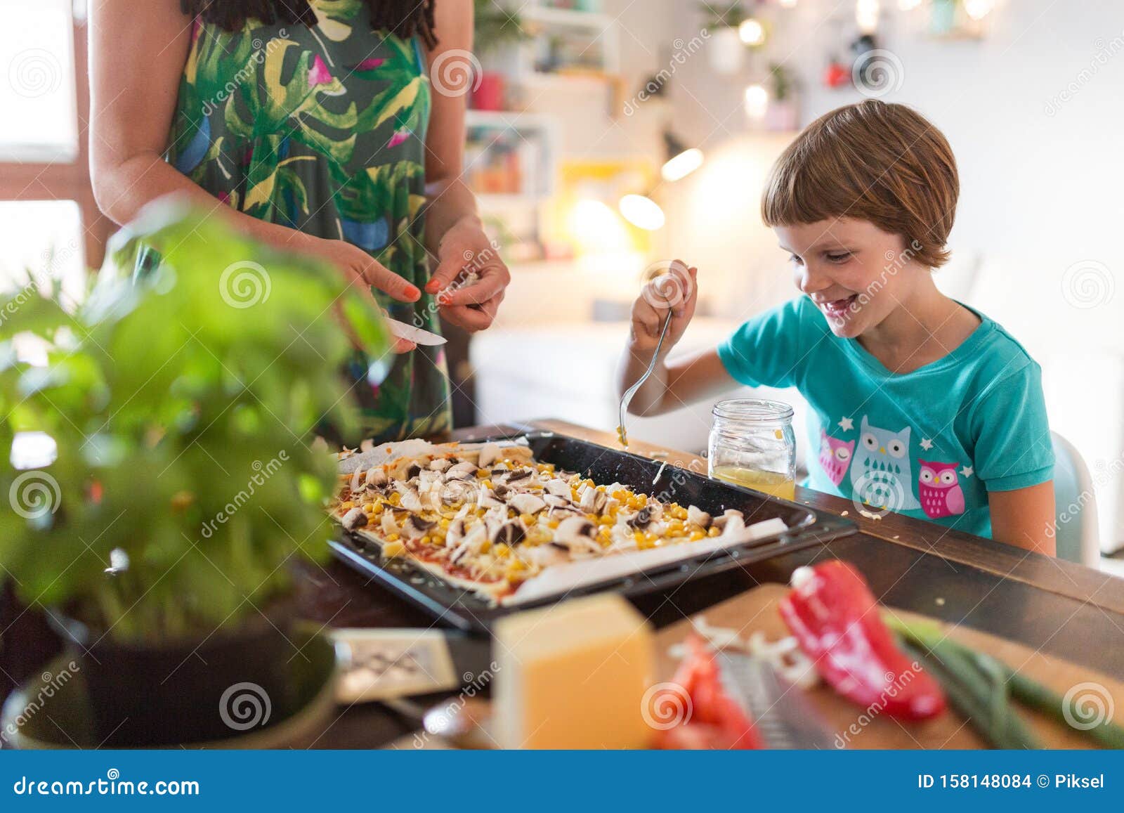 Mother and Daughter Preparing Pizza at Home Stock Photo - Image of ...