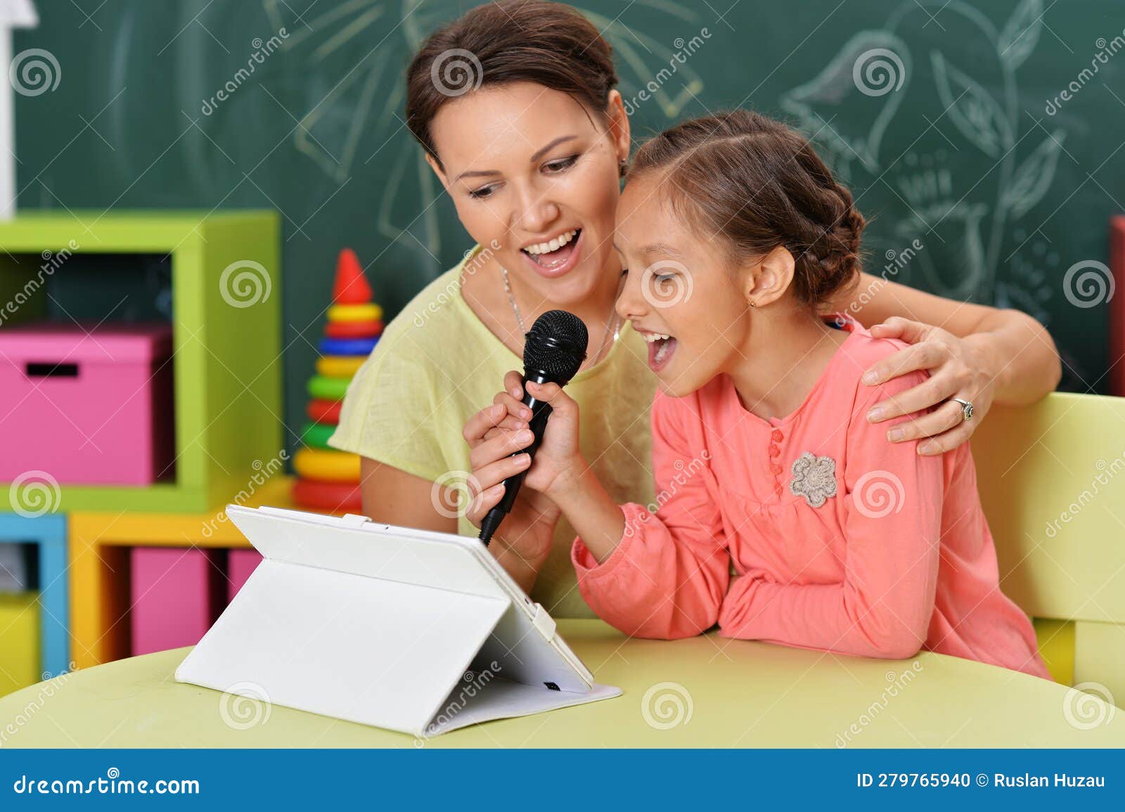 Mother and Daughter Using Tablet Singing Karaoke Stock Photo Image of