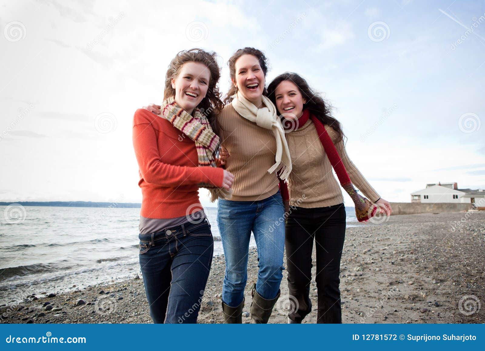 Mother and daughters stock photo. Image of beach, generation - 12781572