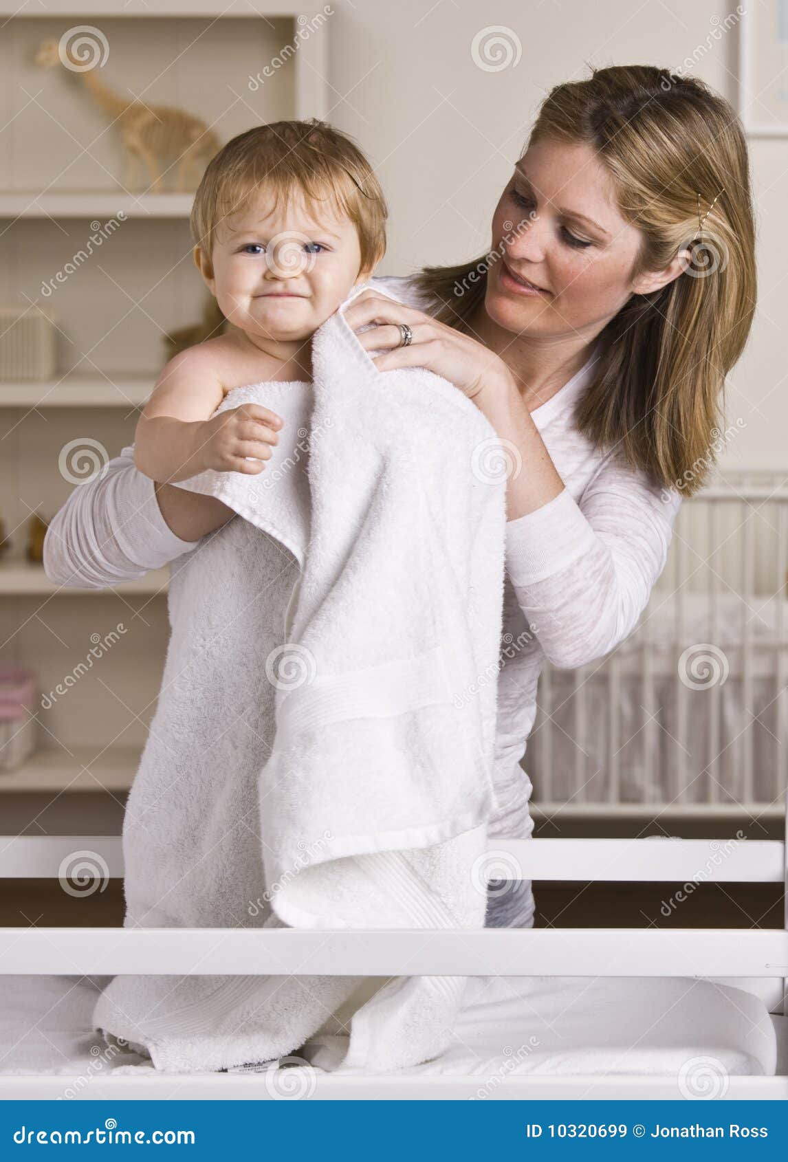 Mother Drying Baby After Bath Stock Photography