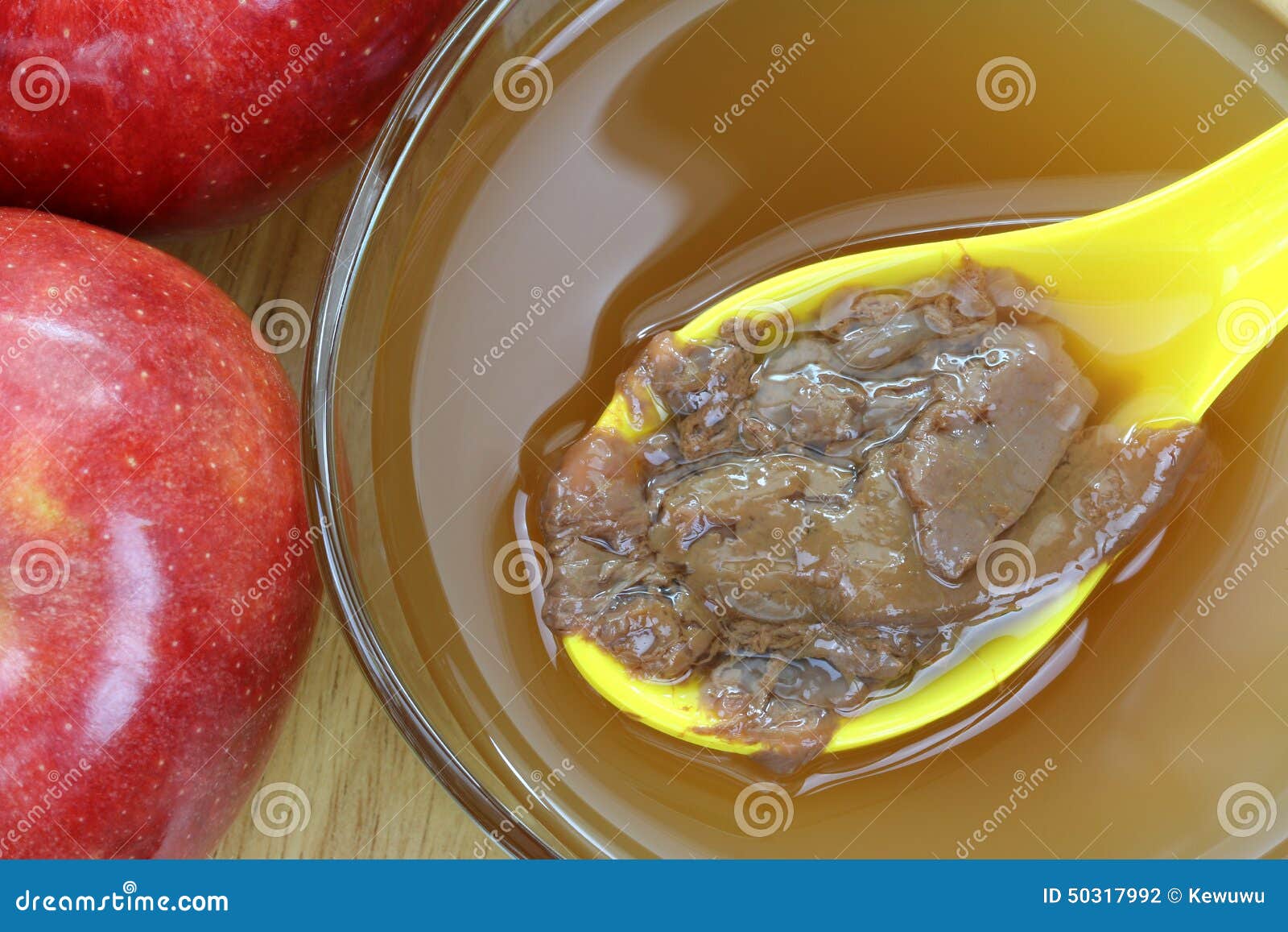 mother enzymes on a bowl of apple cider vinegar