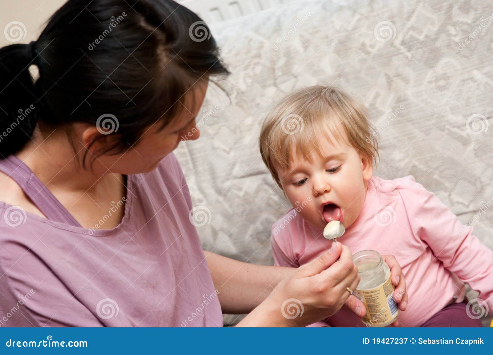 Mother Feeding Baby With Spoon Stock Image Image Of Caucasian