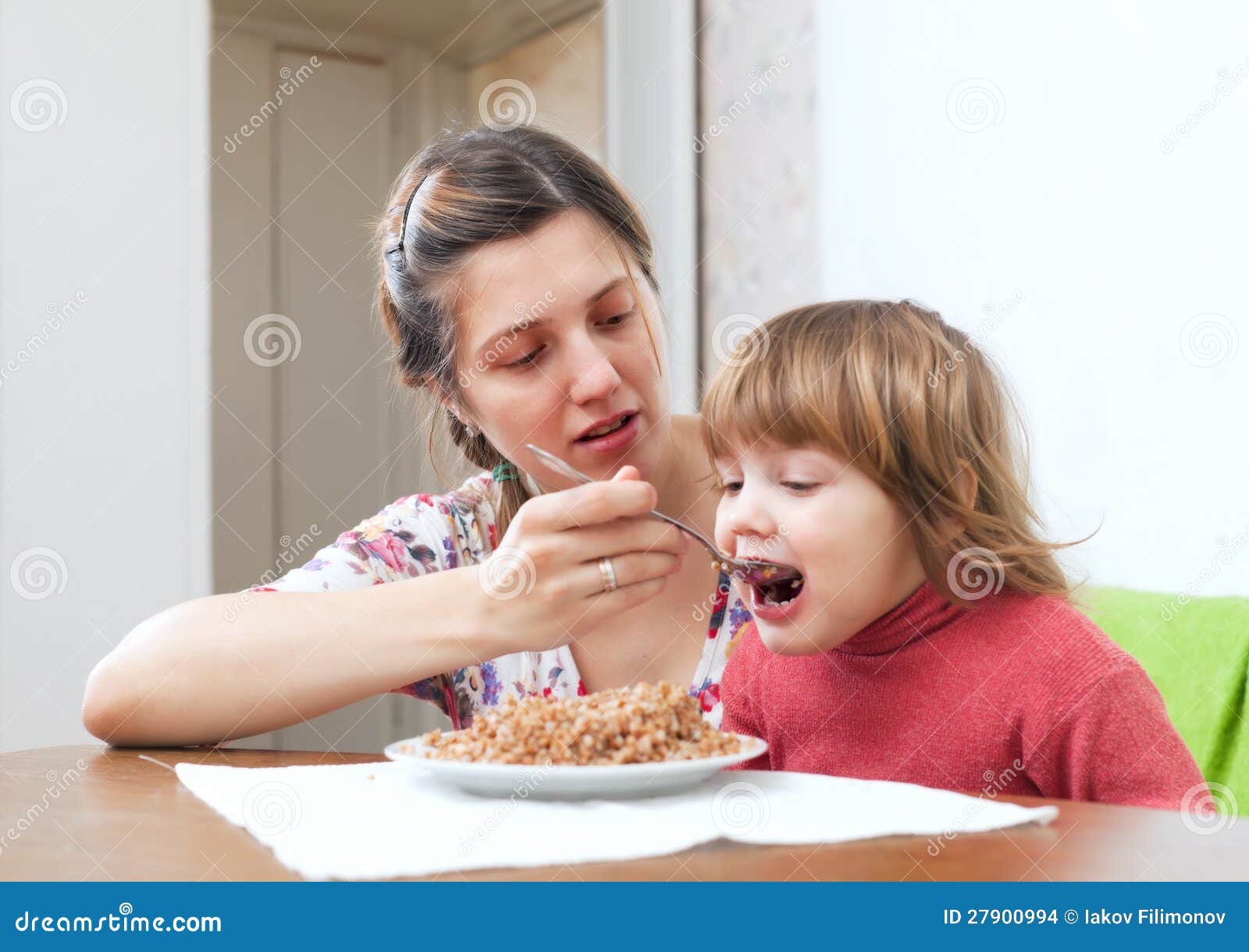 mother feeding her child