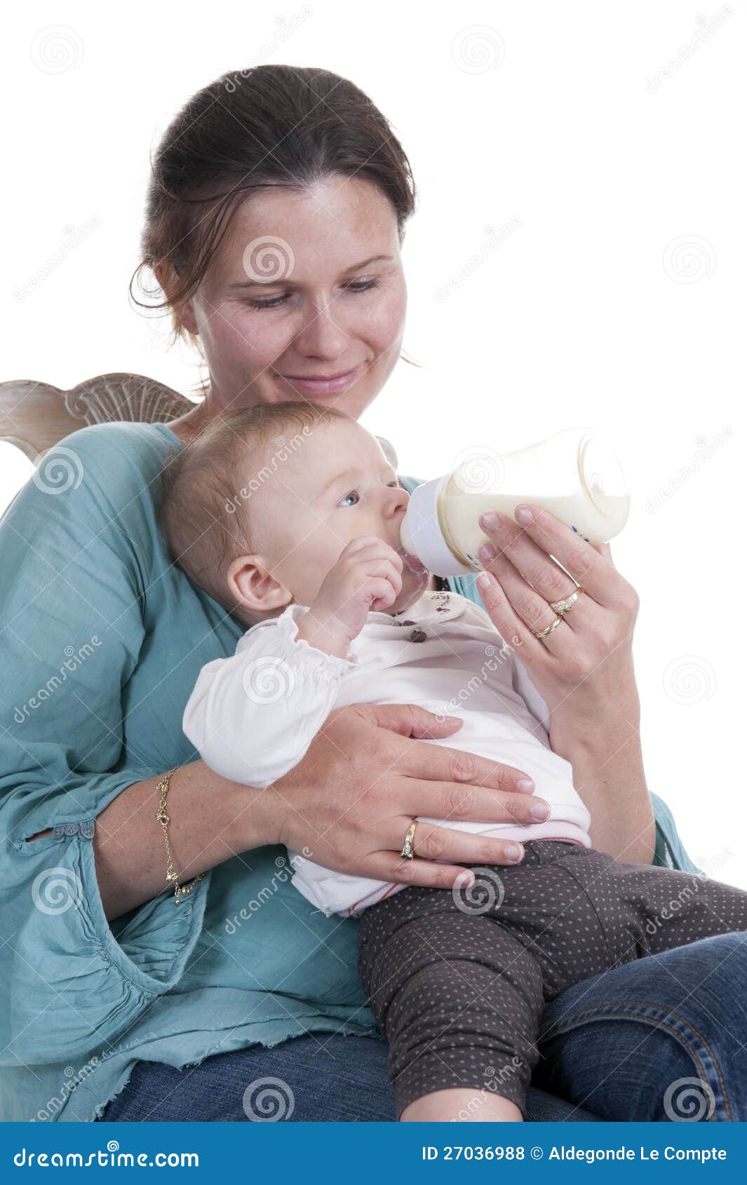 Mother feeding her baby stock photo. Image of milk, studio 27036988