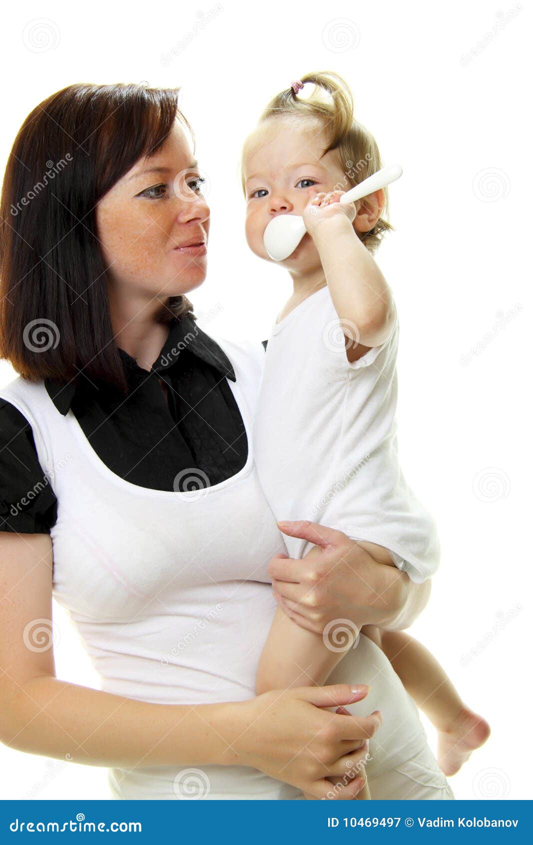 Mother feeding hungry baby stock image. Image of domestic 10469497