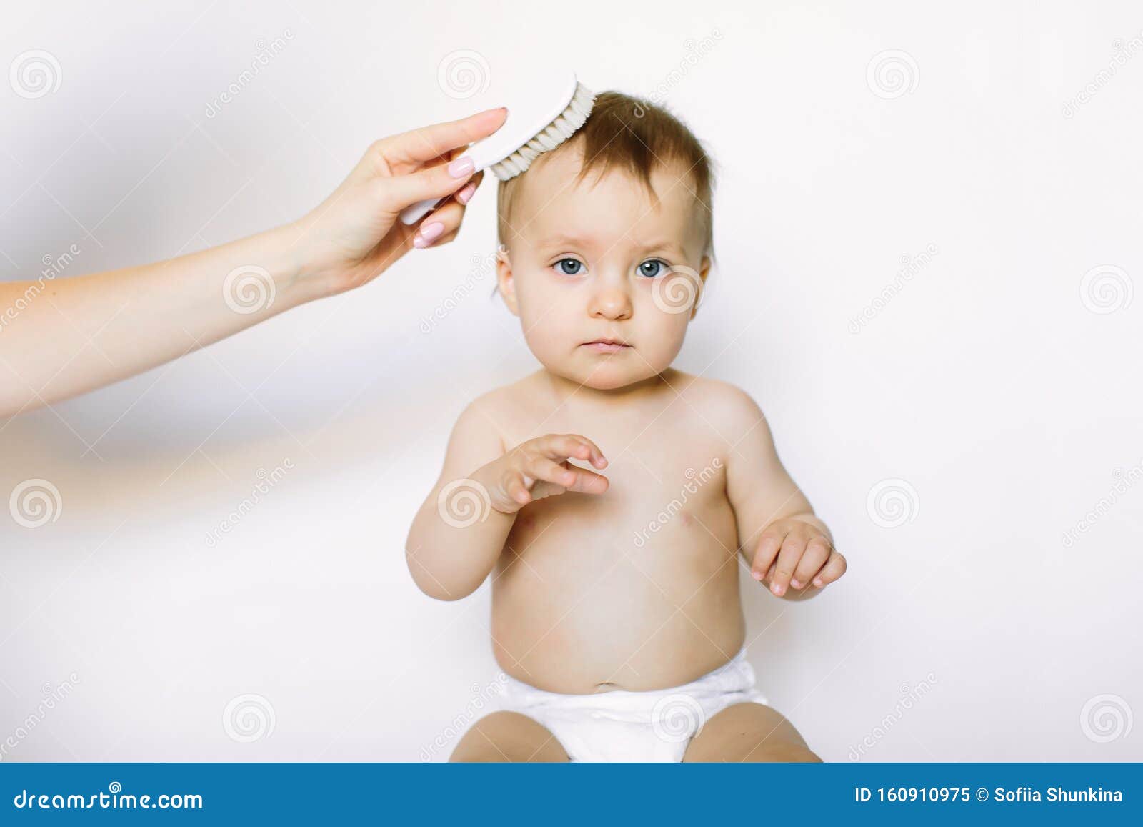 Mother Hand Combing Hair for Her Baby Girl 1 Year Old, on White Background. Baby Care, Healthcare Concept Stock Image - Image of happy, hand: 160910975 Mother Hand Combing Hair for Her Baby Girl 1 Year Old, on White Background. Baby Care, Healthcare Concept Stock Image - Image of happy, hand: 160910975