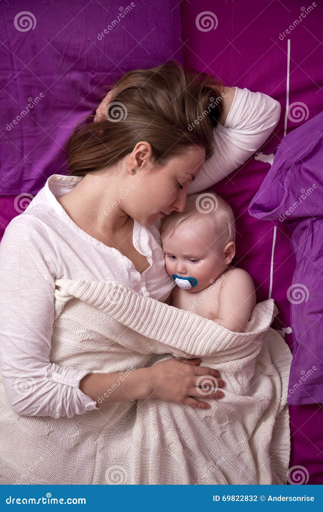 Mother with Her Baby Sleeping in Bed Stock Photo Image of pacifier