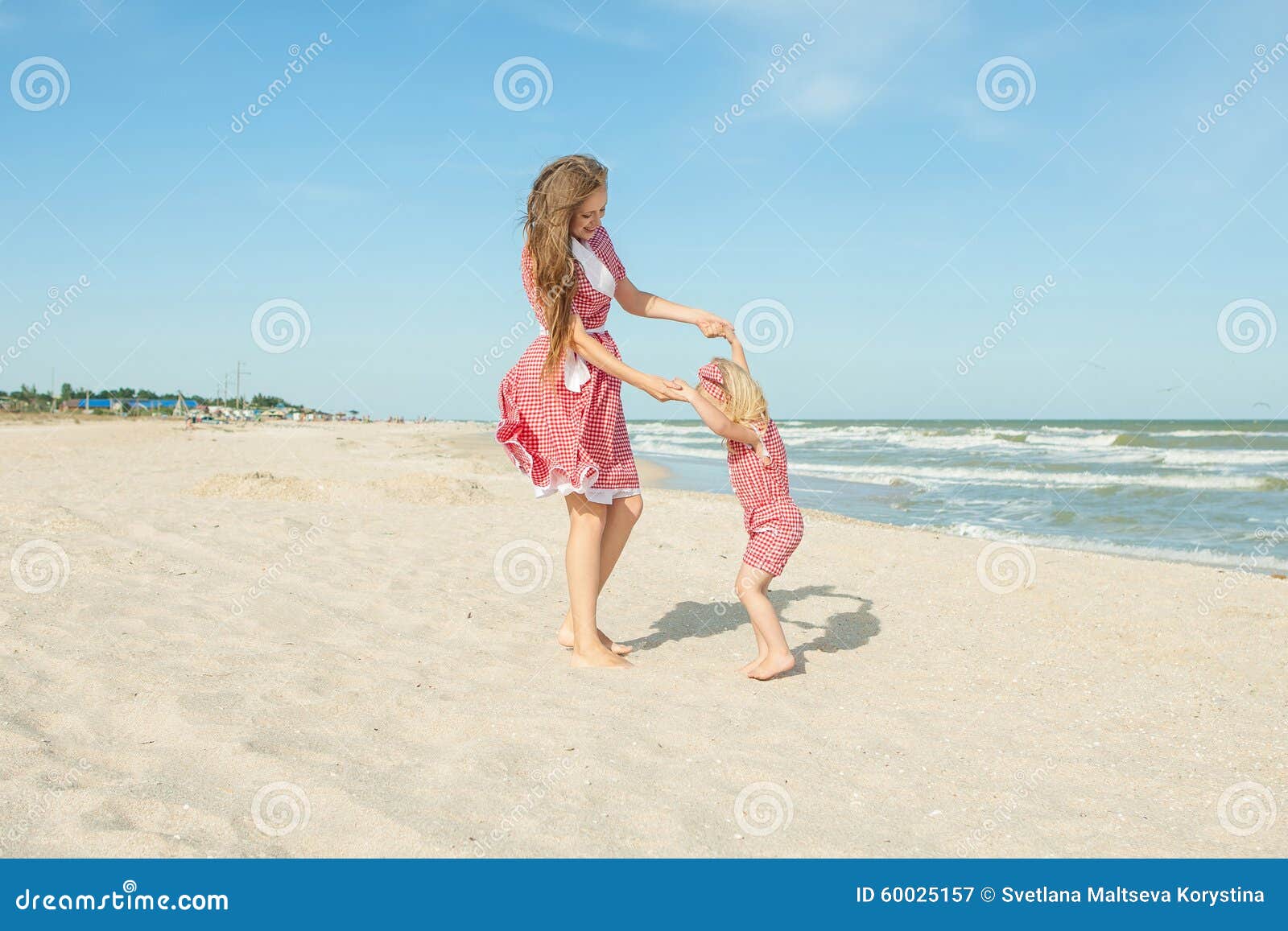 Mother And Her Daughter Having Fun On The Beach Stock Image Image Of 