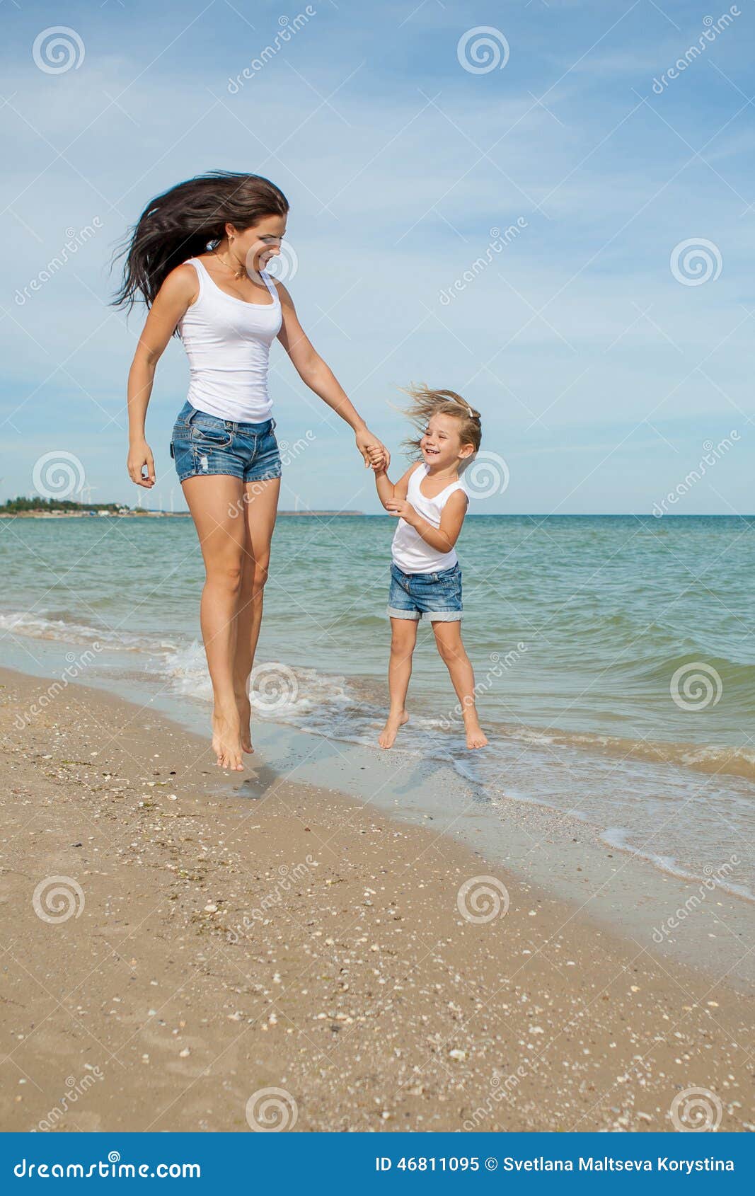 Mother And Her Daughter Having Fun On The Beach Stock Image Image Of 