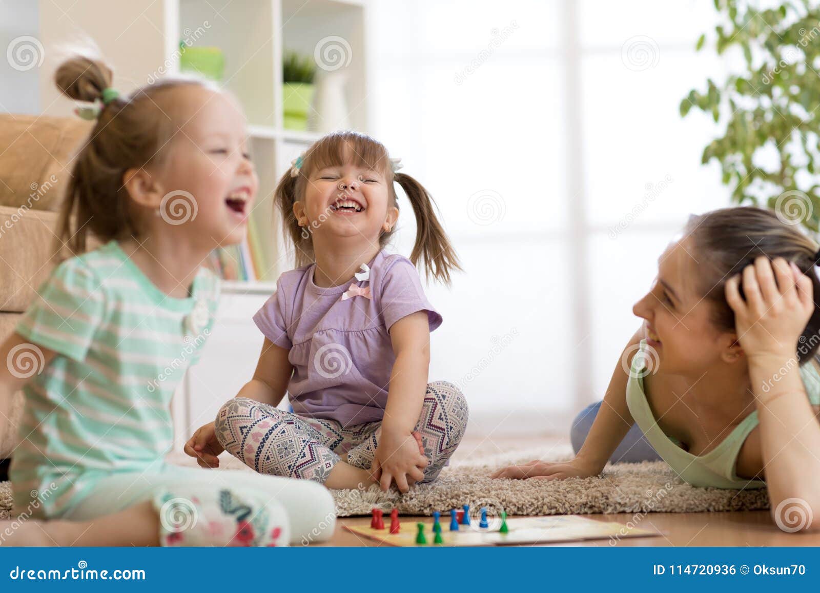Mother and Her Daughters Playing in Board Game Stock Photo Image of