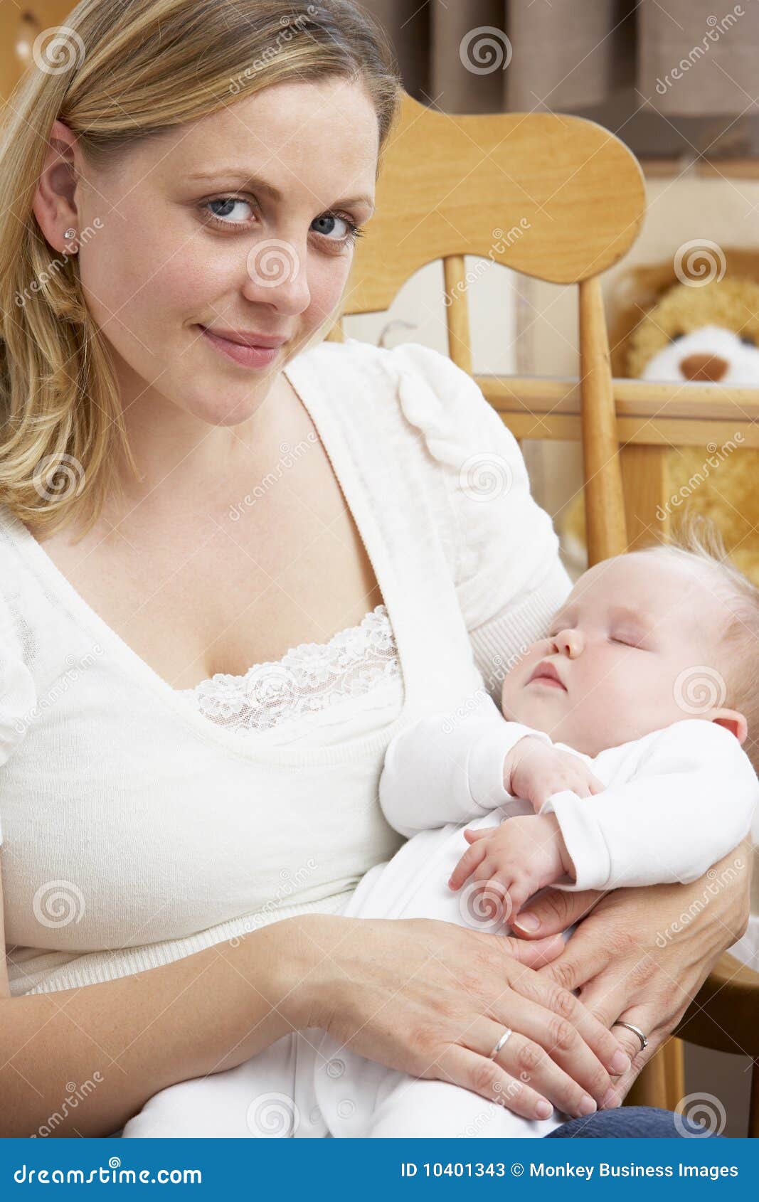 Mother Holding Baby In Nursery Stock Image - Image of five, peaceful