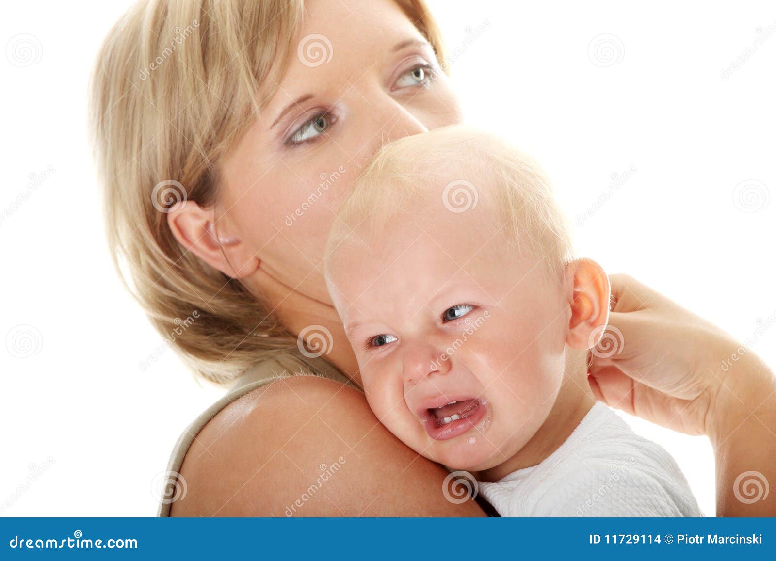 Mother Holding Her Crying Baby Isolated Stock Photo