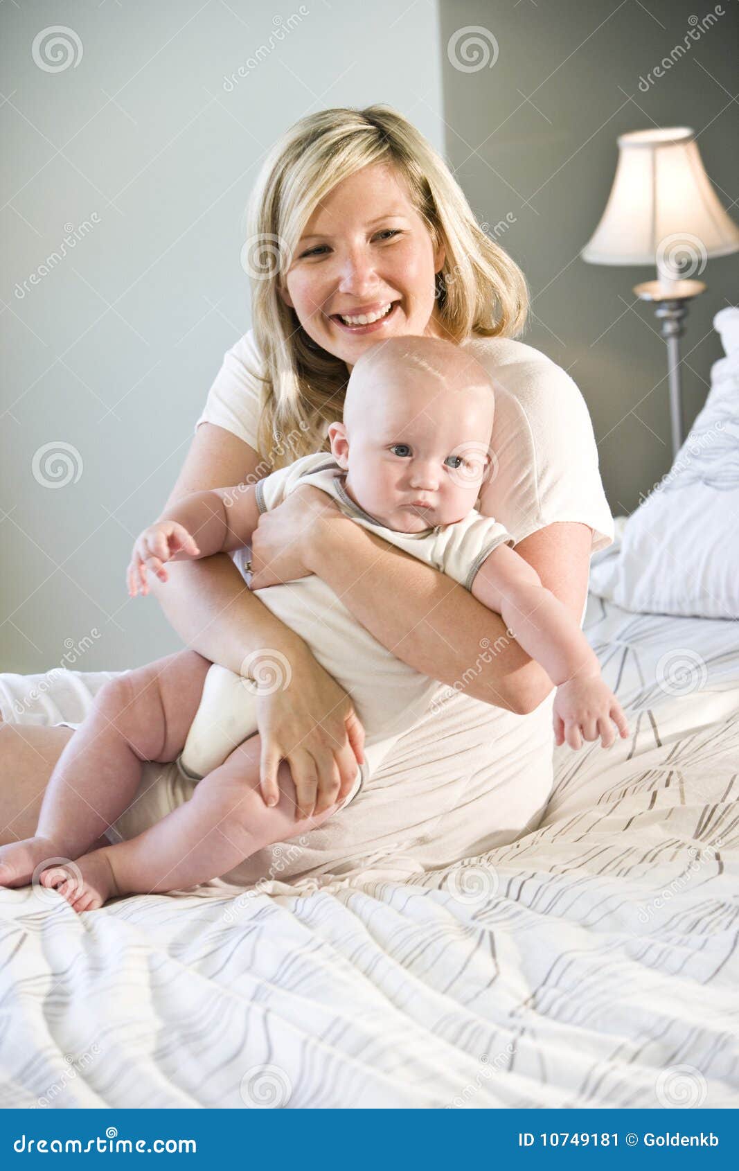 Mother Hugging Chubby Seven Month Old Baby Stock Image - Image: 10749181