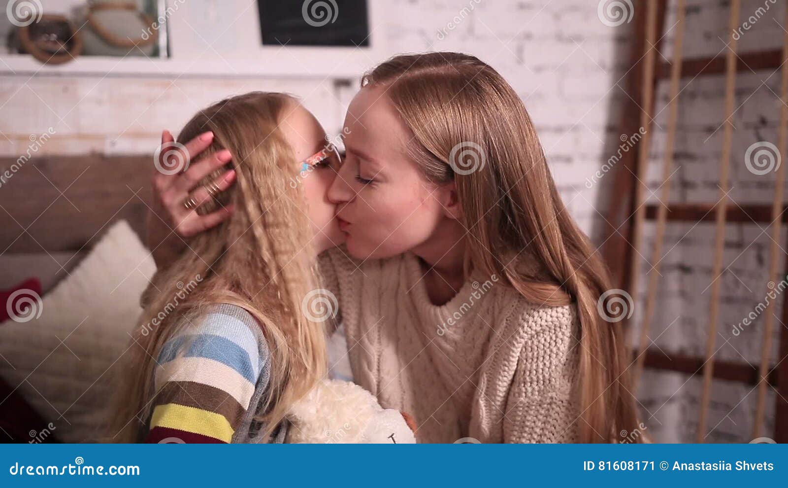 Mother Kissing Happy Little Daughter's Cheek Stock Footage & Video...