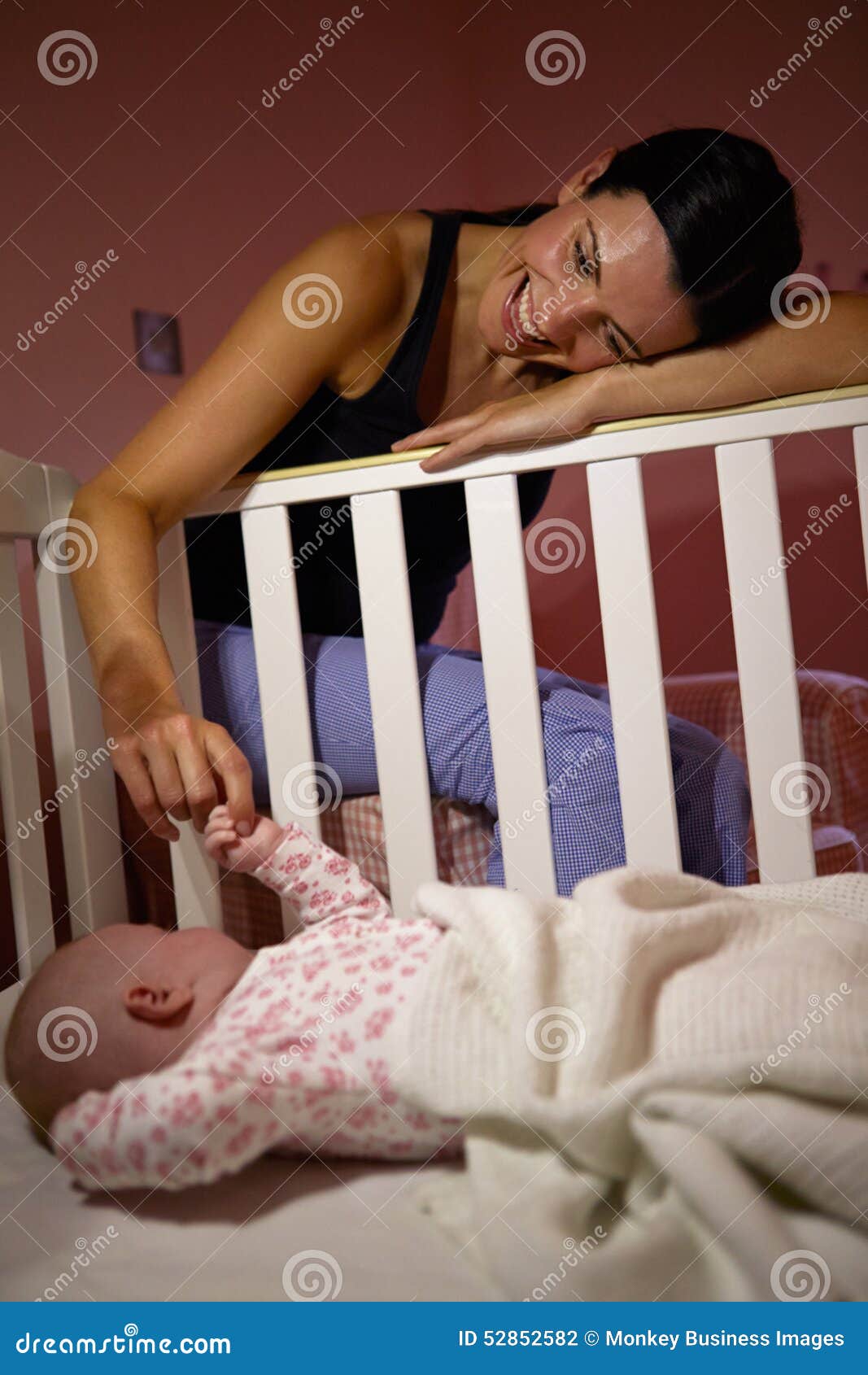 Mother Playing Game with Newborn Baby in Cot Stock Photo Image of