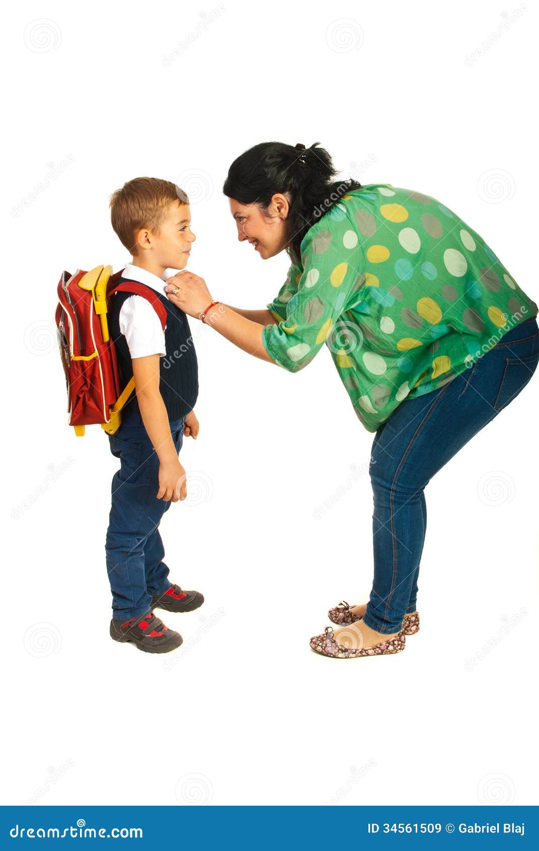 mother prepare boy for school