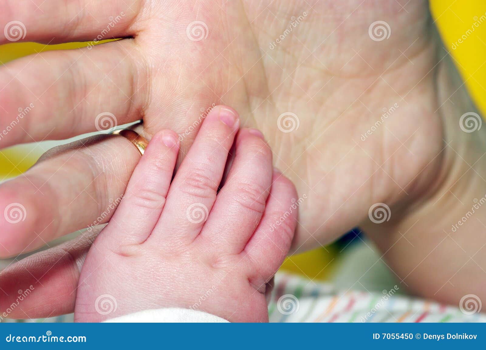 Mother s and baby s hands stock photo. Image of parent 7055450