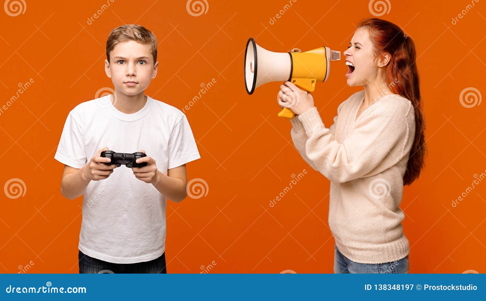 Mother Shouting through Megaphone at Boy with Joystick Stock Image