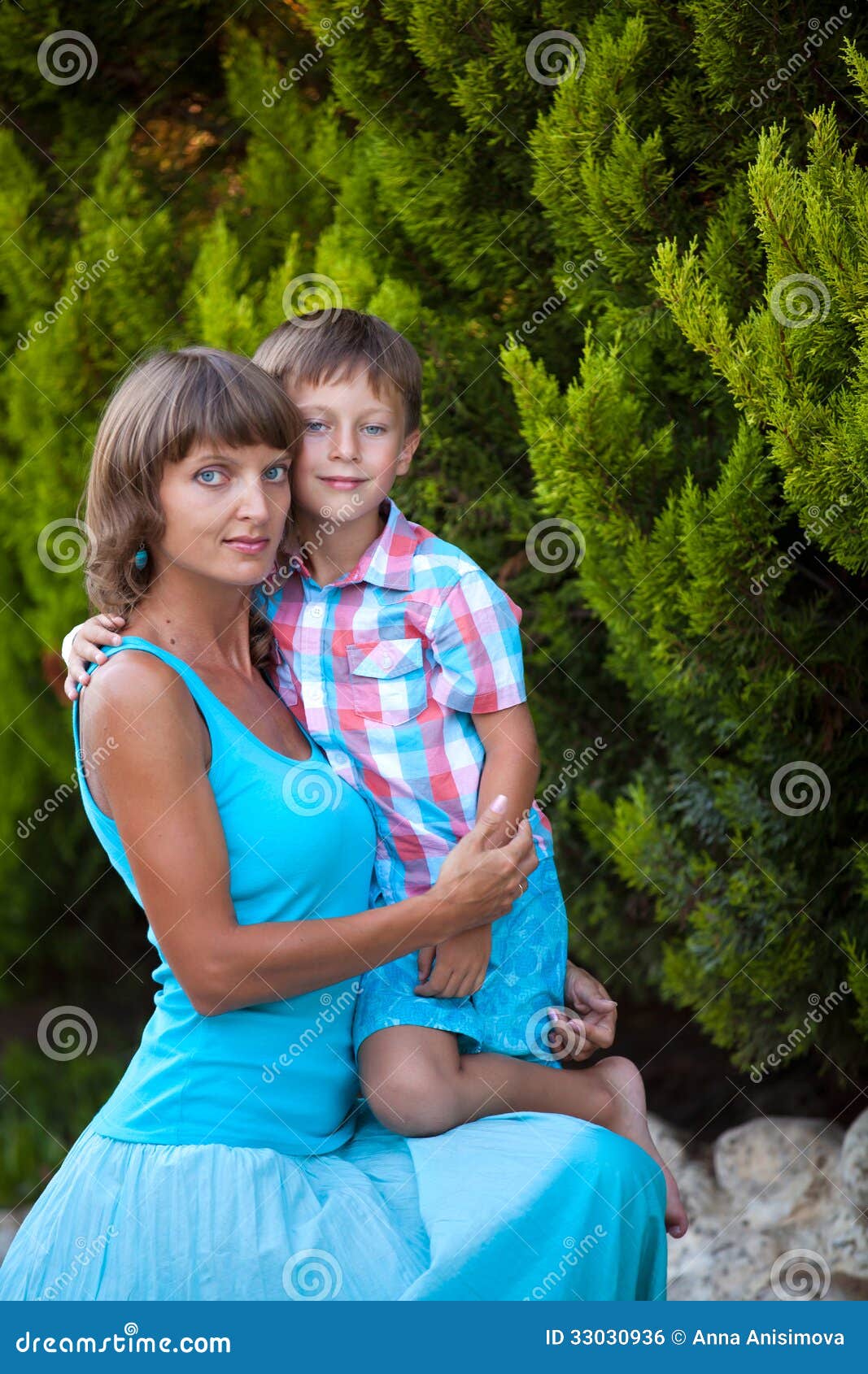Mother and son in garden stock photo. Image of female - 33030936