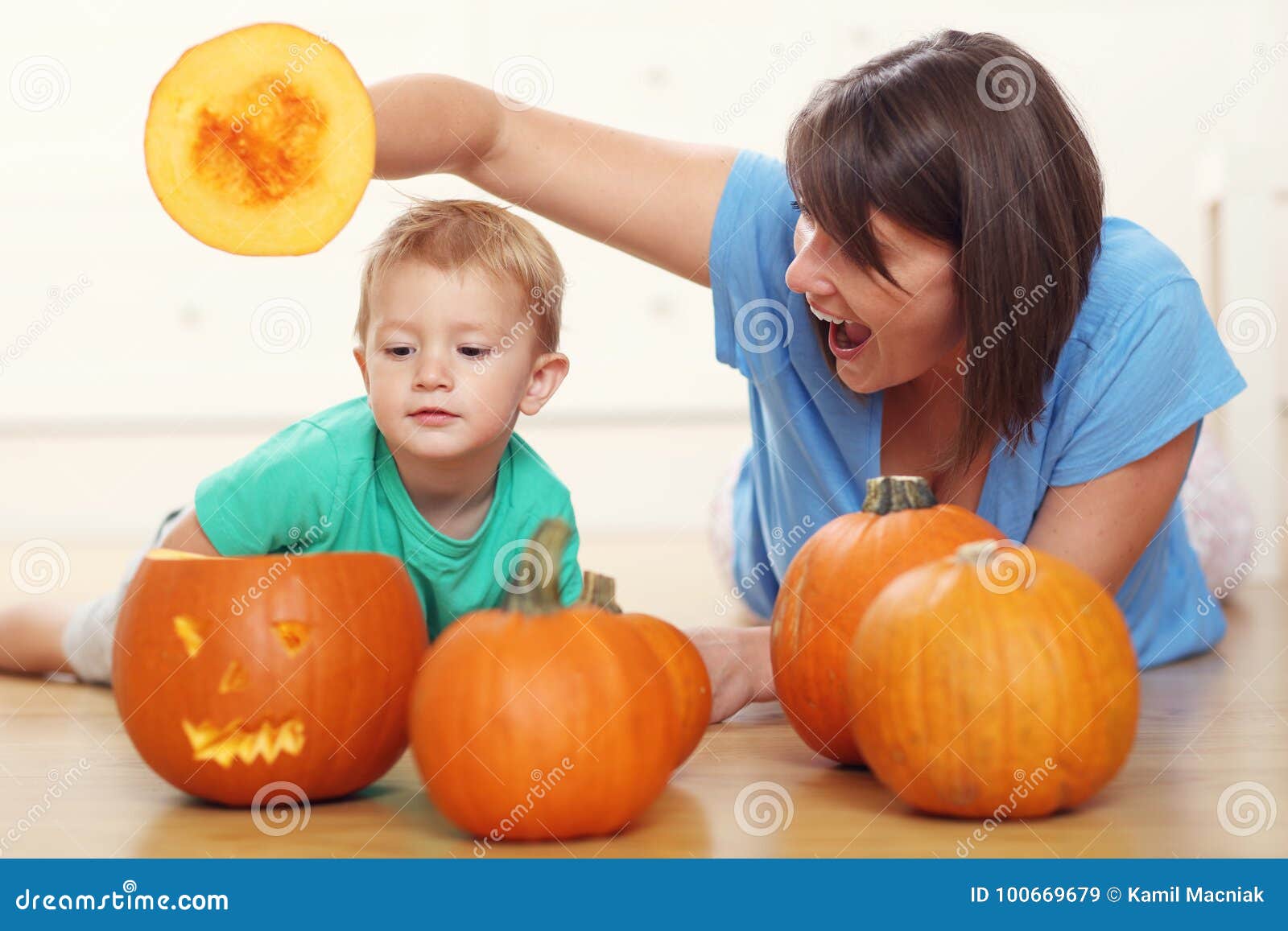 Mother and Son Preparing Jack-o-lantern for Halloween Stock Image ...