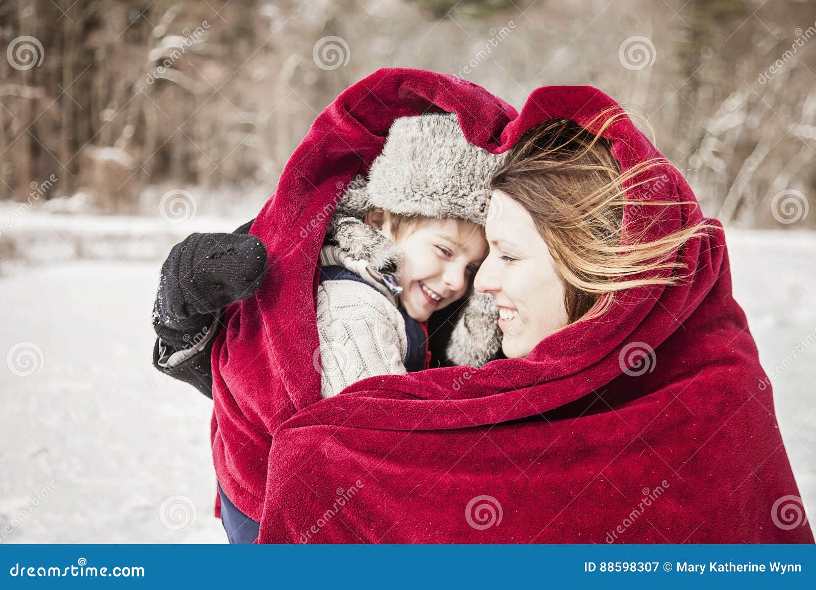 Mother and Son Snuggling Under Blanket Stock Image Image of love
