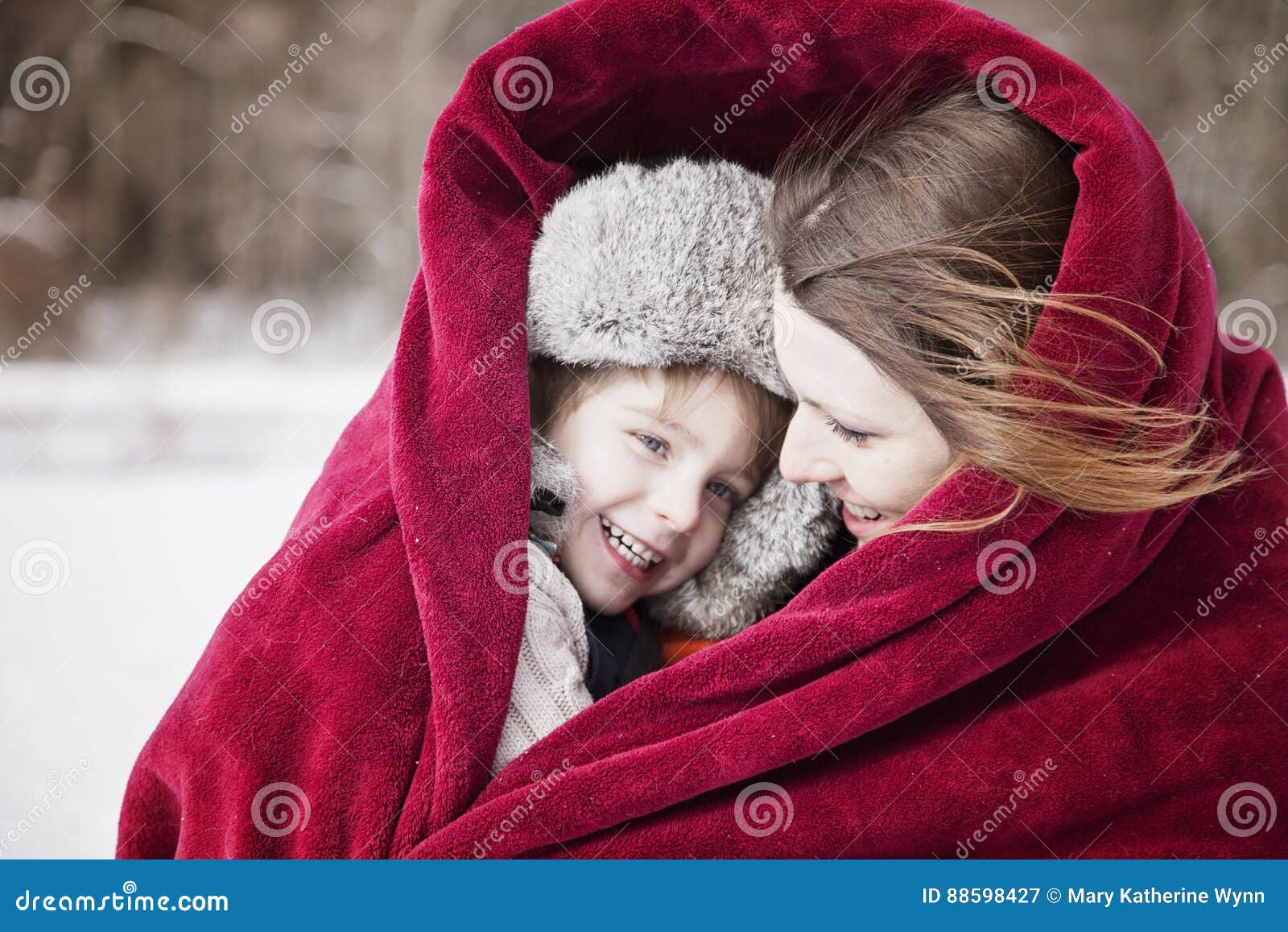 Mother and Son Snuggling Under Blanket Stock Image Image of happiness