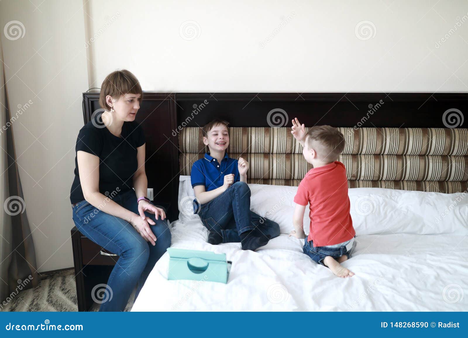 Mother With Sons On Bed Stock Photo Image Of People
