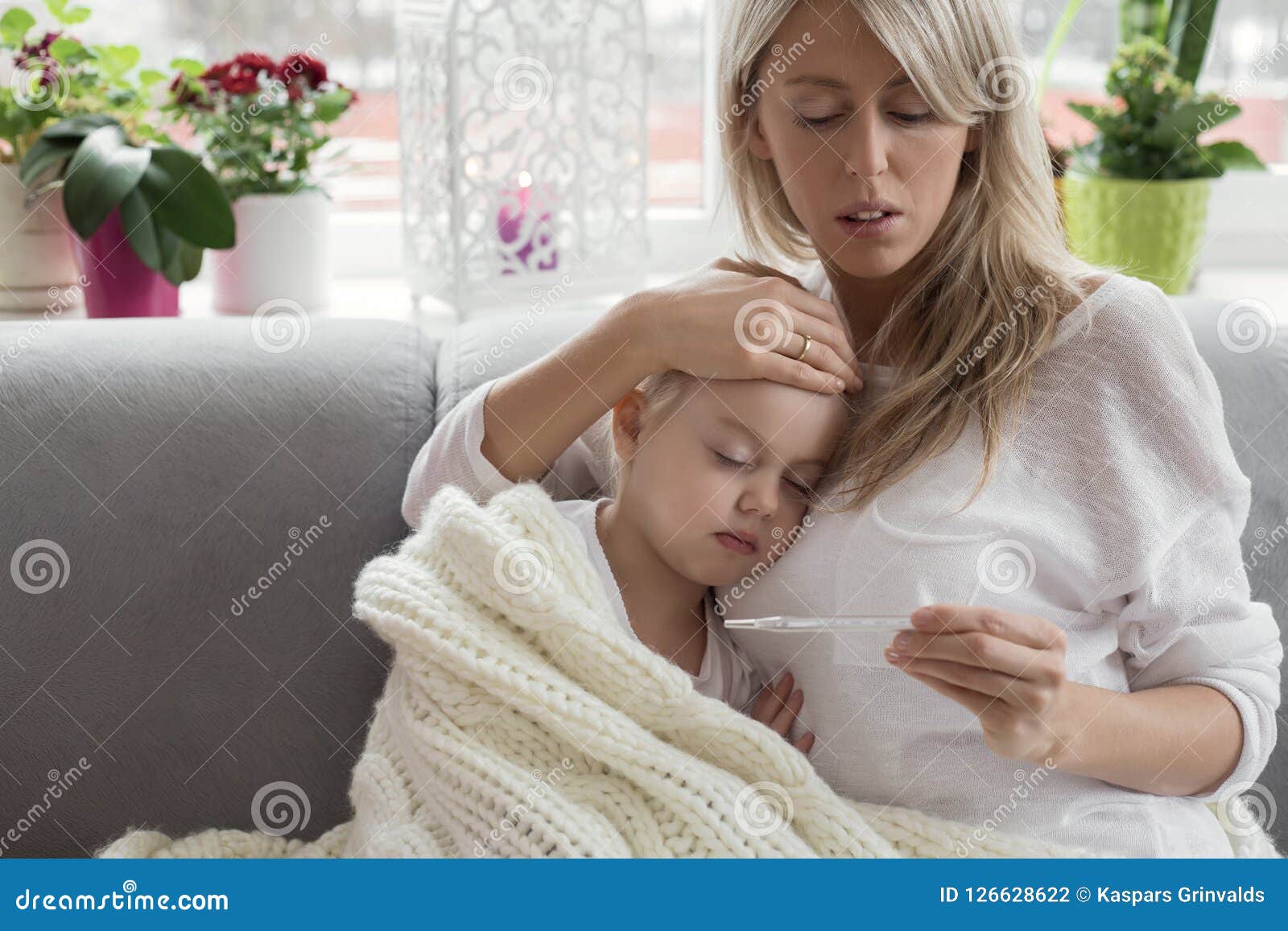 mother staying at home with her sick child