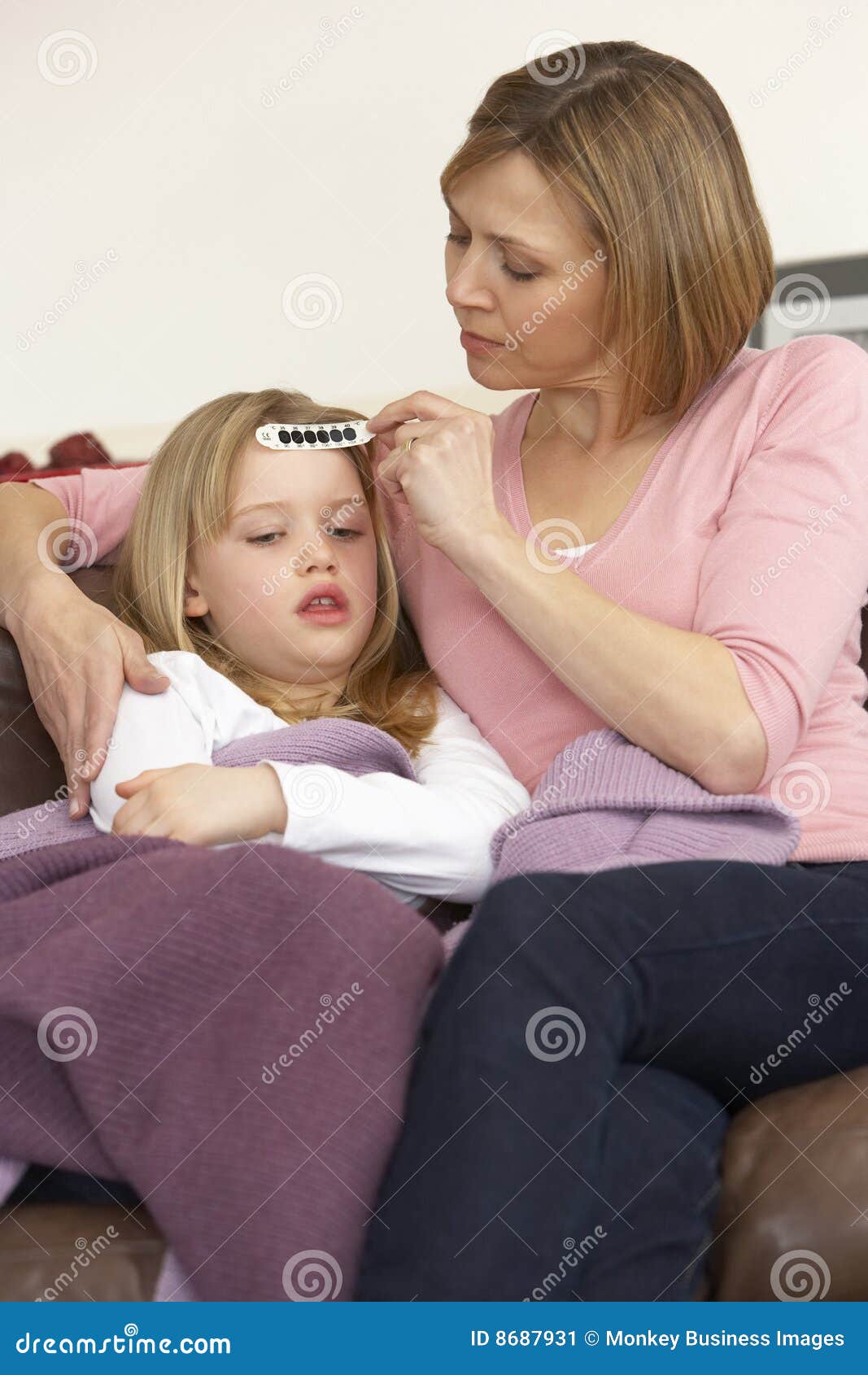 Mother Taking Care Of Sick Daughter With Oxygen Mask And Teddy B Stock