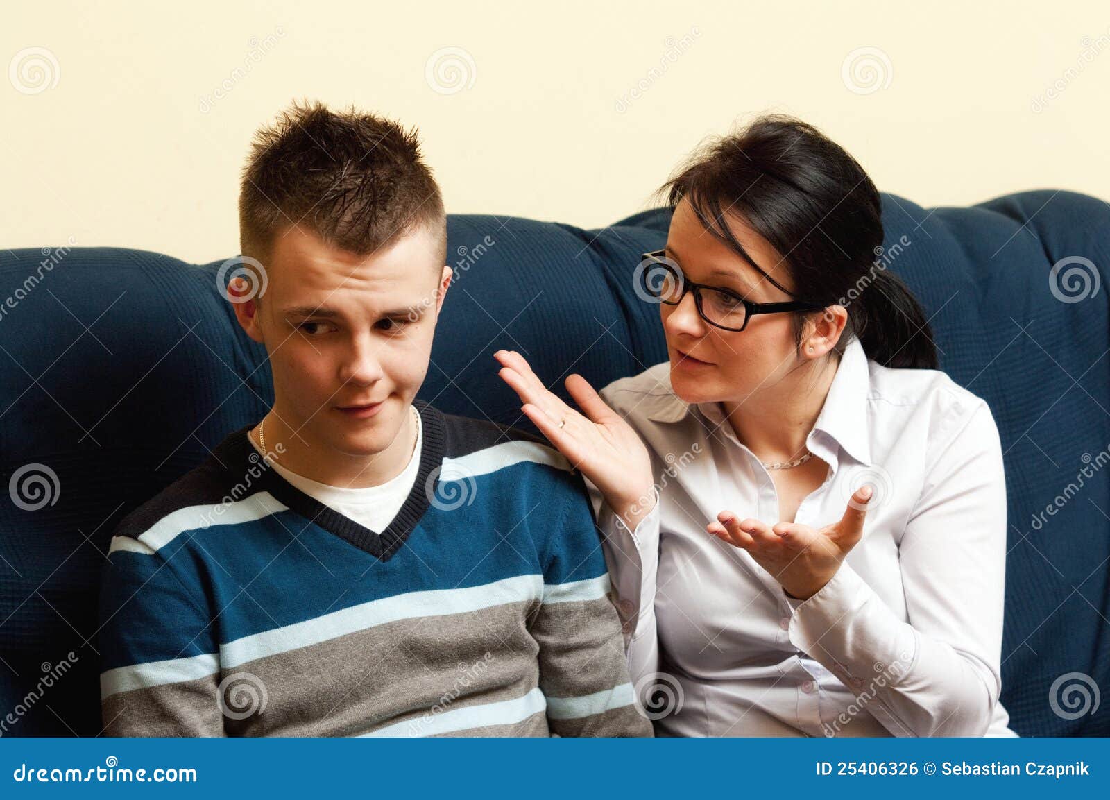 Mother with teenage son stock photo. Image of scolding 