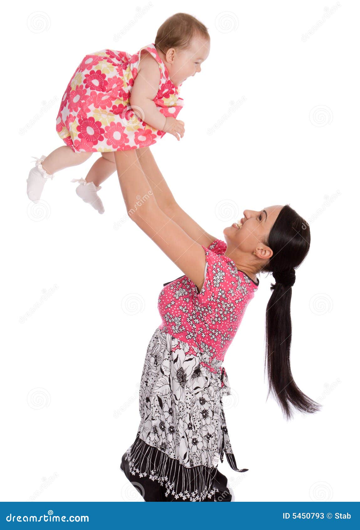 A Mother Throws His Infant Child into the Air Stock Image Image of