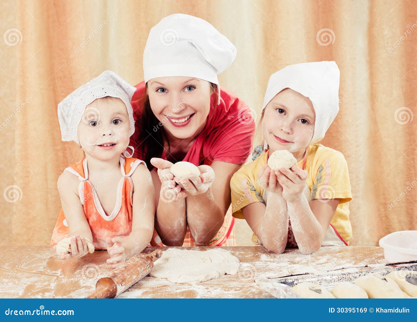 Mother With Two Daughters Baking Bread Stock Image Image Of Beautiful Activity 30395169