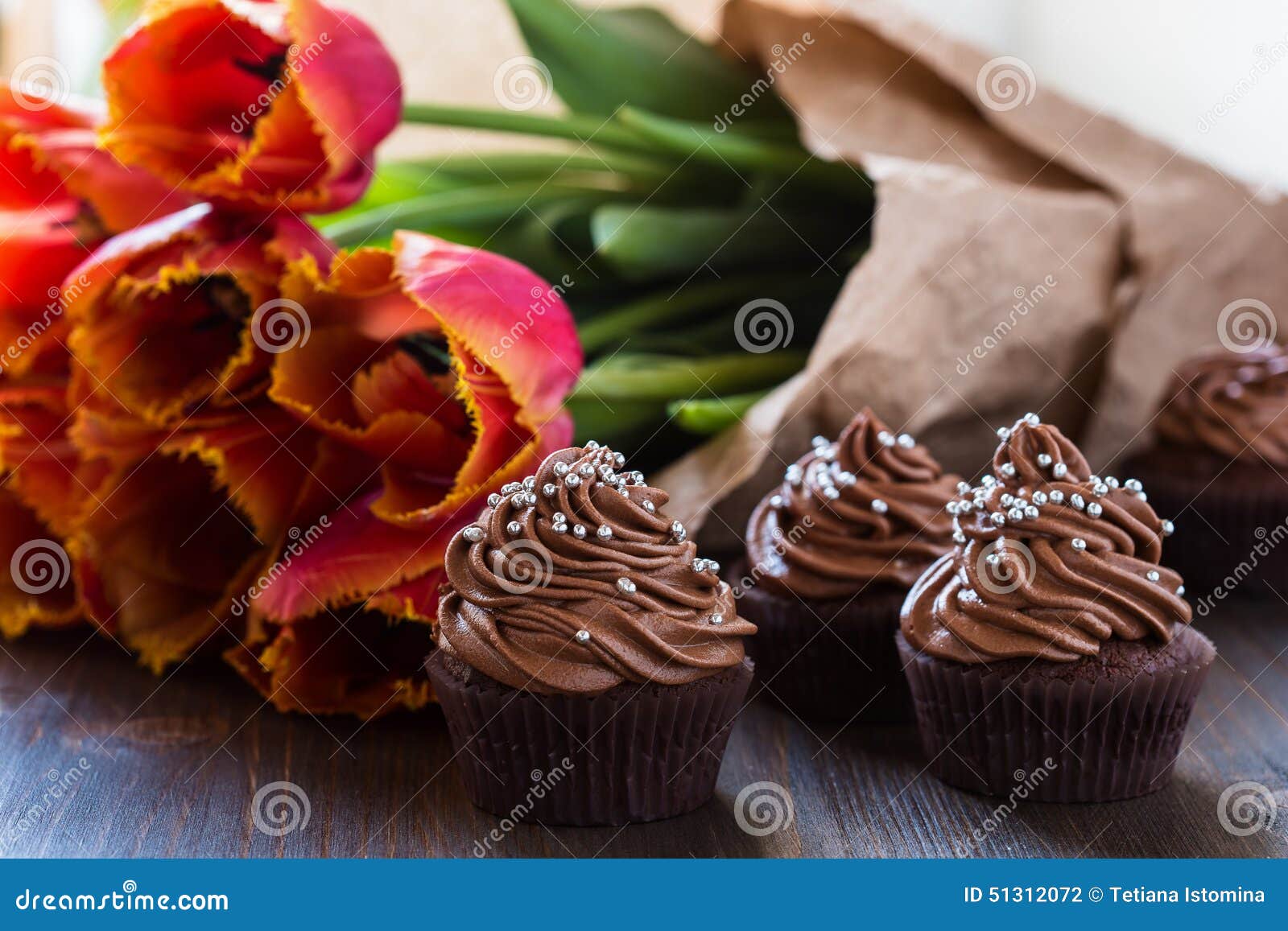 Mothers Day Chocolate Cupcakes with Spring Tulips Stock Photo Image